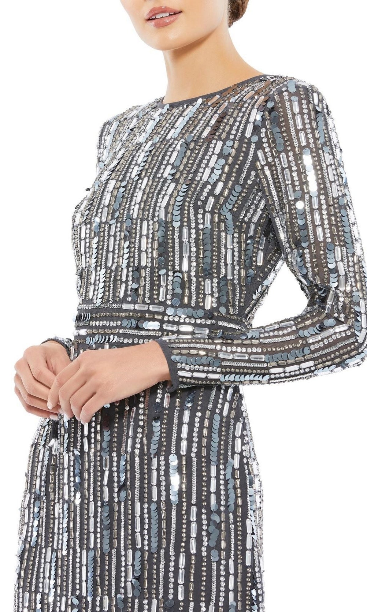 Woman in the Mac Duggal Beaded Striped Wedding-Guest Dress 93590A, a charcoal silver midi with long sleeves and vertical sequin rows. Her face is partially out of frame.