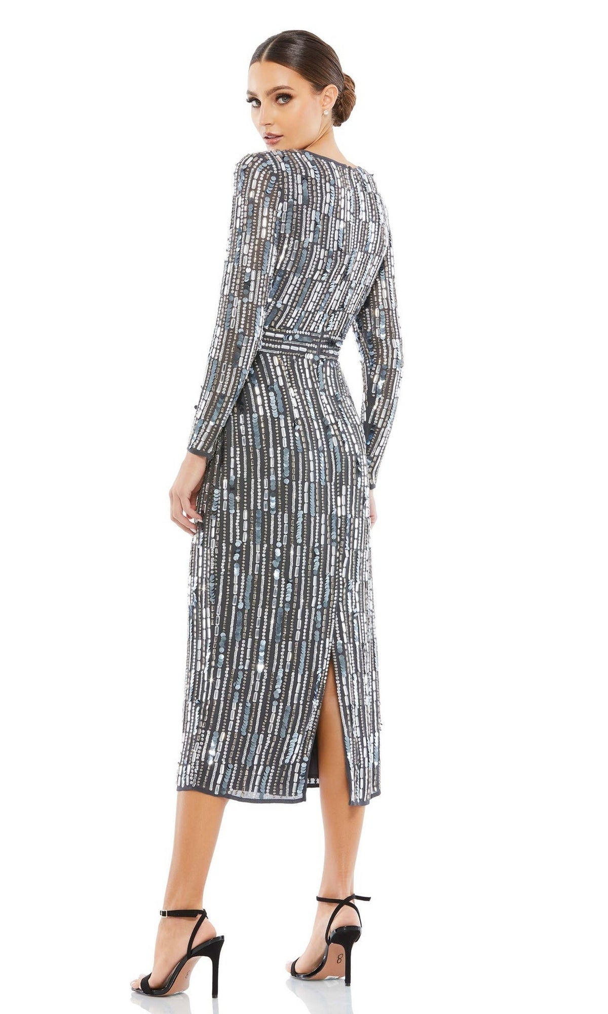 Woman modeling the Mac Duggal Beaded Striped Wedding-Guest Dress 93590A in charcoal silver, featuring beaded stripes and a back slit, with black heels against a white background—an elegant pick for wedding guests.