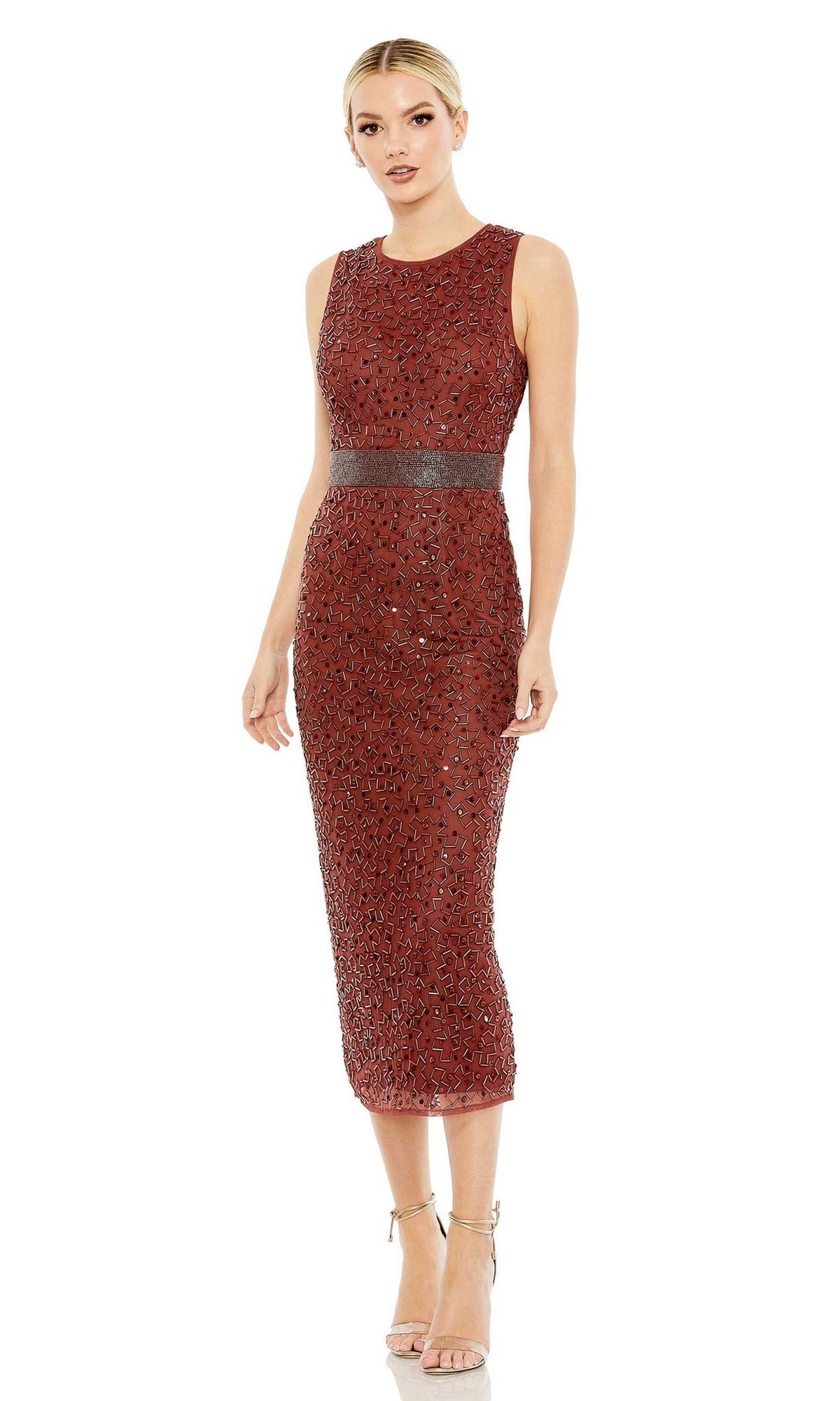A woman wears the Mac Duggal 93758 Beaded Midi Wedding-Guest Dress—sleeveless, rust-colored with black sequin accents and a dark waistband—styled with strappy high heels for a stunning event look.