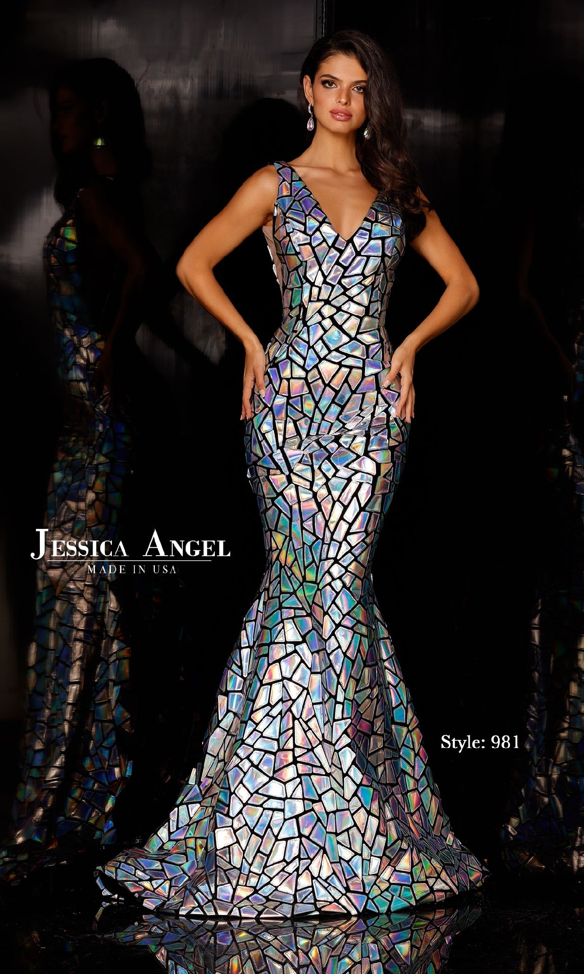 A woman wears the Jessica Angel 981, a fitted, floor-length long silver sequin prom dress featuring a geometric, iridescent mosaic pattern and mermaid skirt.