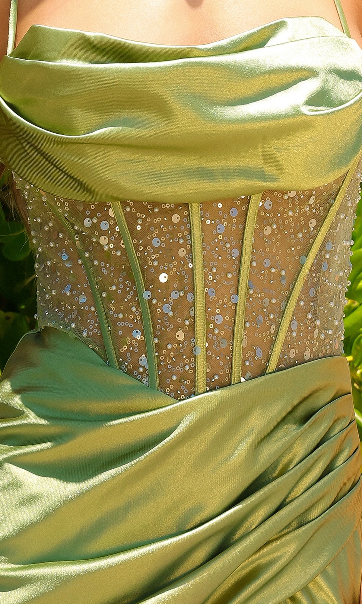 Close-up of the Sheer-Corset Cowl-Neck Long Prom Dress BZ020, a green satin gown with a sheer sequined boned corset panel and draped waist detail.