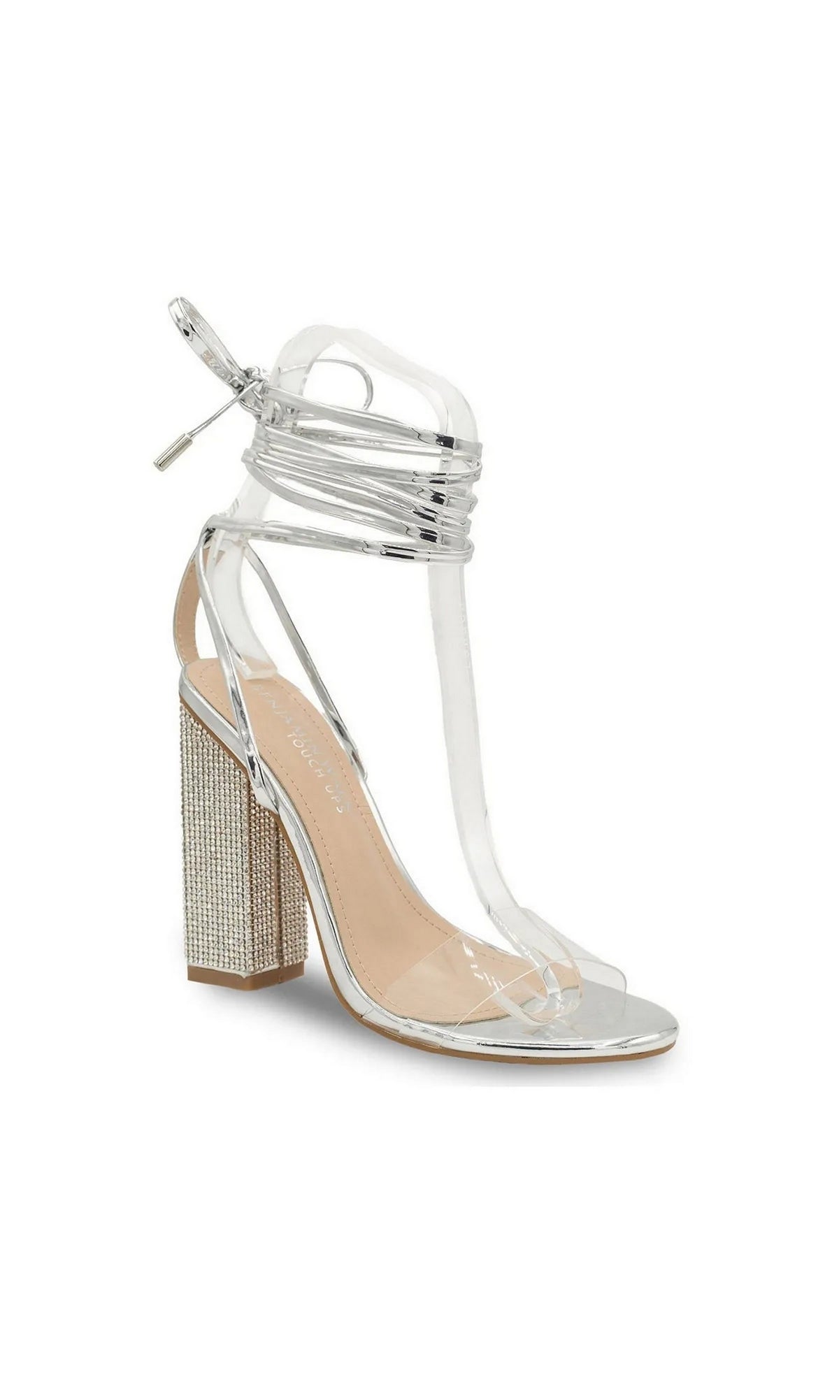 Bowie Silver Block Heel Prom Shoes: Touch Ups 4689 featuring a silver block heel, clear straps, wraparound ankle laces, and a crystal-encrusted heel.