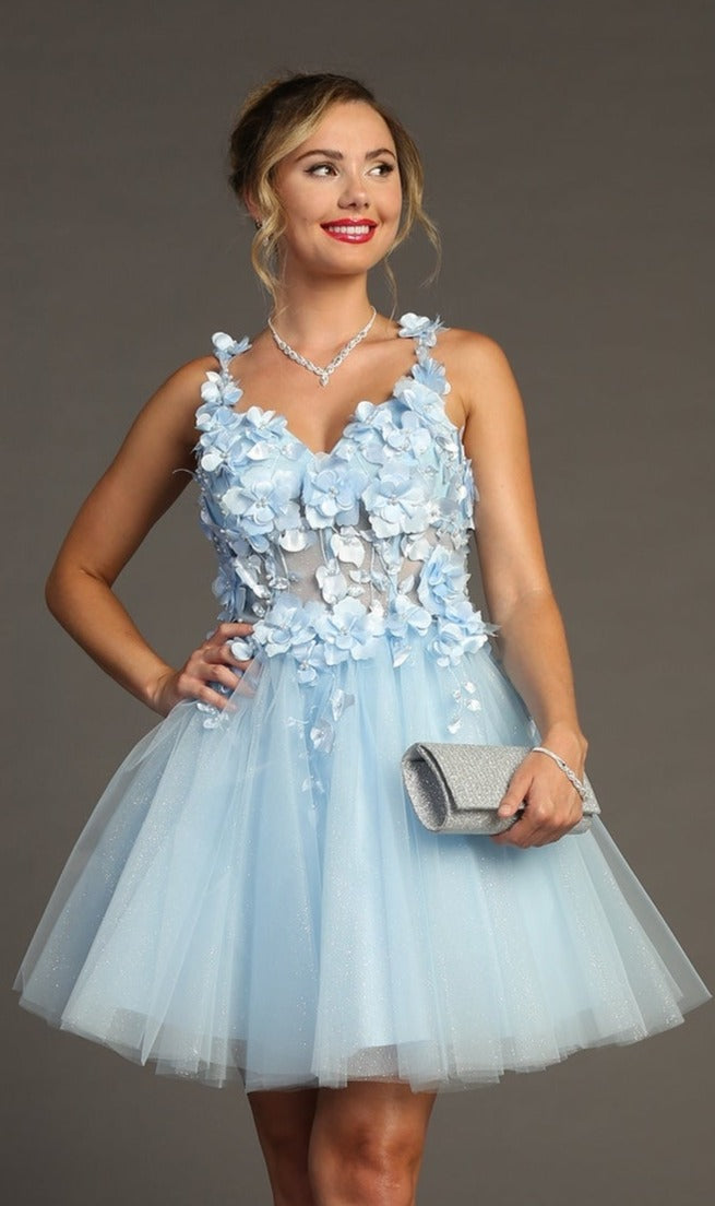 A woman stands against a gray background in the Floral-Bodice Short Babydoll Homecoming Dress C321—light blue, sleeveless, knee-length with appliqué details—holding a silver clutch and wearing jewelry and red lipstick.