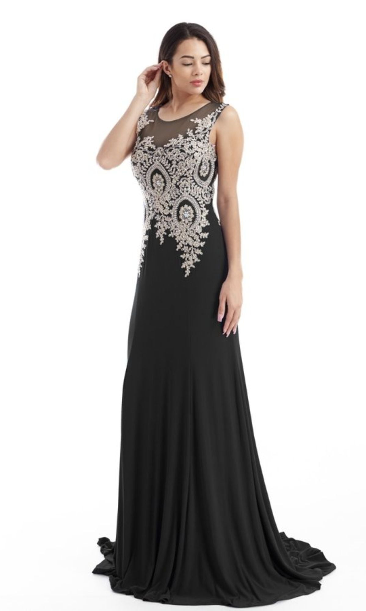 A woman stands against a plain white background wearing the Chicas C4233 Gold-Embroidered Long Prom Dress.