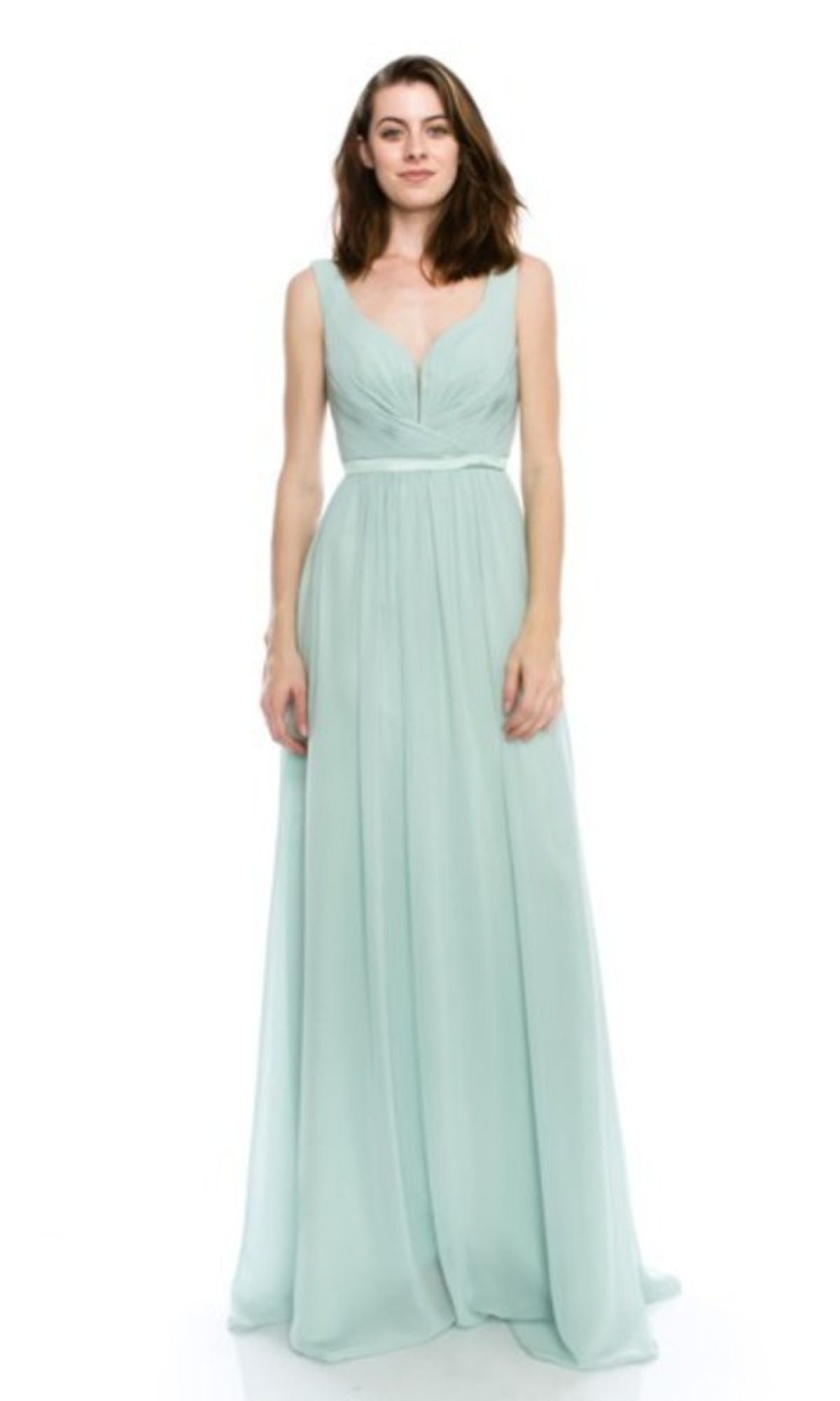 A woman poses against a white background in the Deep V-Back Long A-Line Prom Dress: Chicas C7818—a sleeveless, floor-length, light blue-green gown with a V-neckline and gathered waist, ideal for elegant evenings.