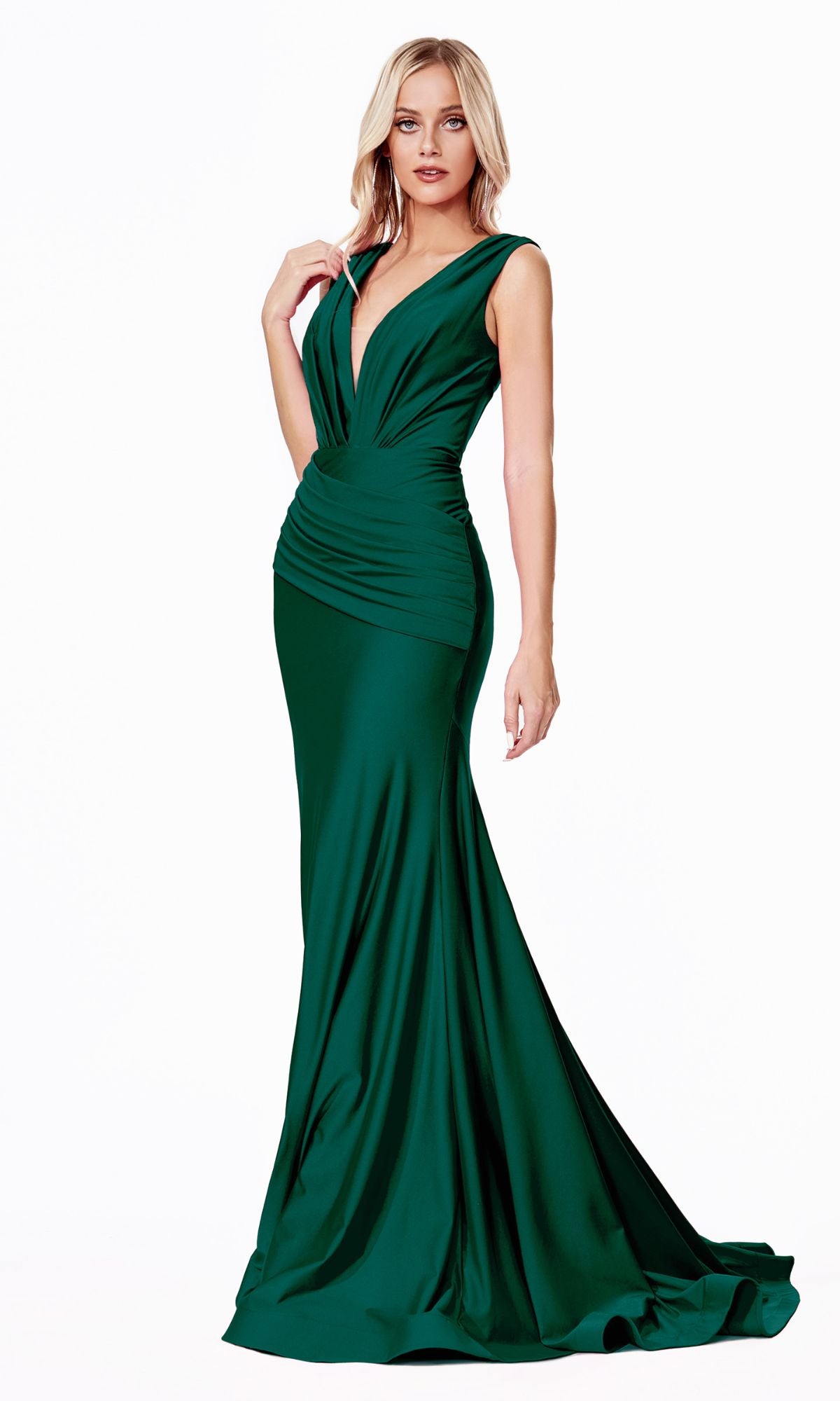 A woman wearing the Pleated-Waist Long Sleeveless Prom Dress CD912, featuring a stretch satin fabric with a draped bodice and fitted waist in deep green, stands against a plain white background.