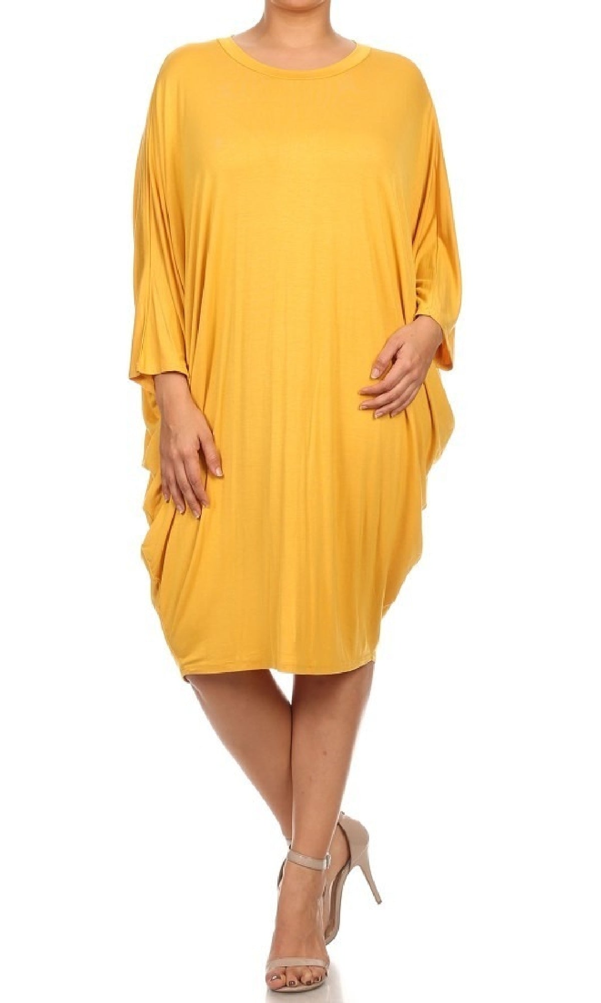 A person wearing a yellow Short Casual Plus Size Dress with dolman sleeves and beige high-heeled sandals.