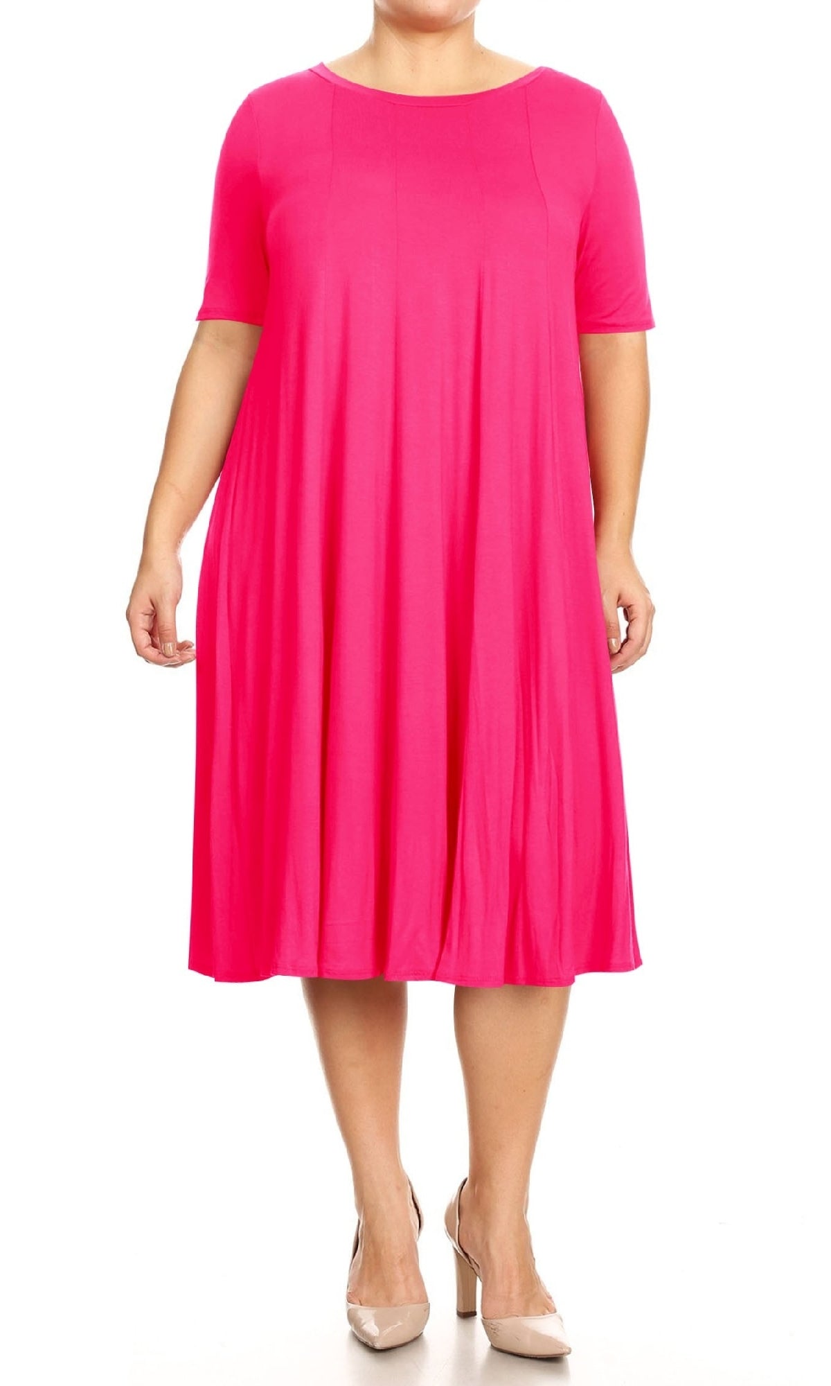A person wears the Plus-Size Jersey Knit Oversized A-Line Casual Dress in bright pink with short sleeves, paired with beige heels, standing against a white background.