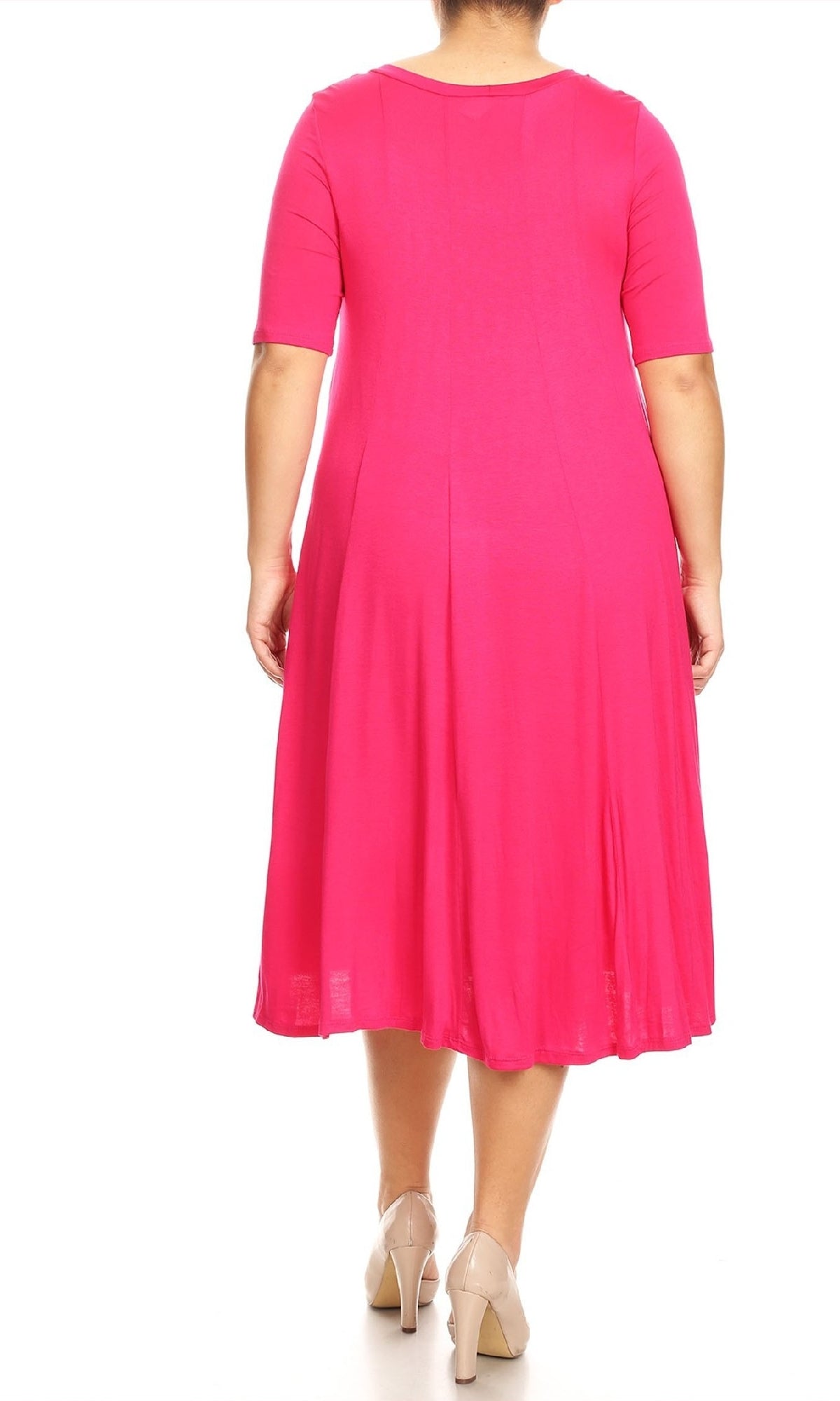 A person is shown from the back against a white background wearing the Plus-Size Jersey Knit Oversized A-Line Casual Dress in bright pink, paired with beige high heels.