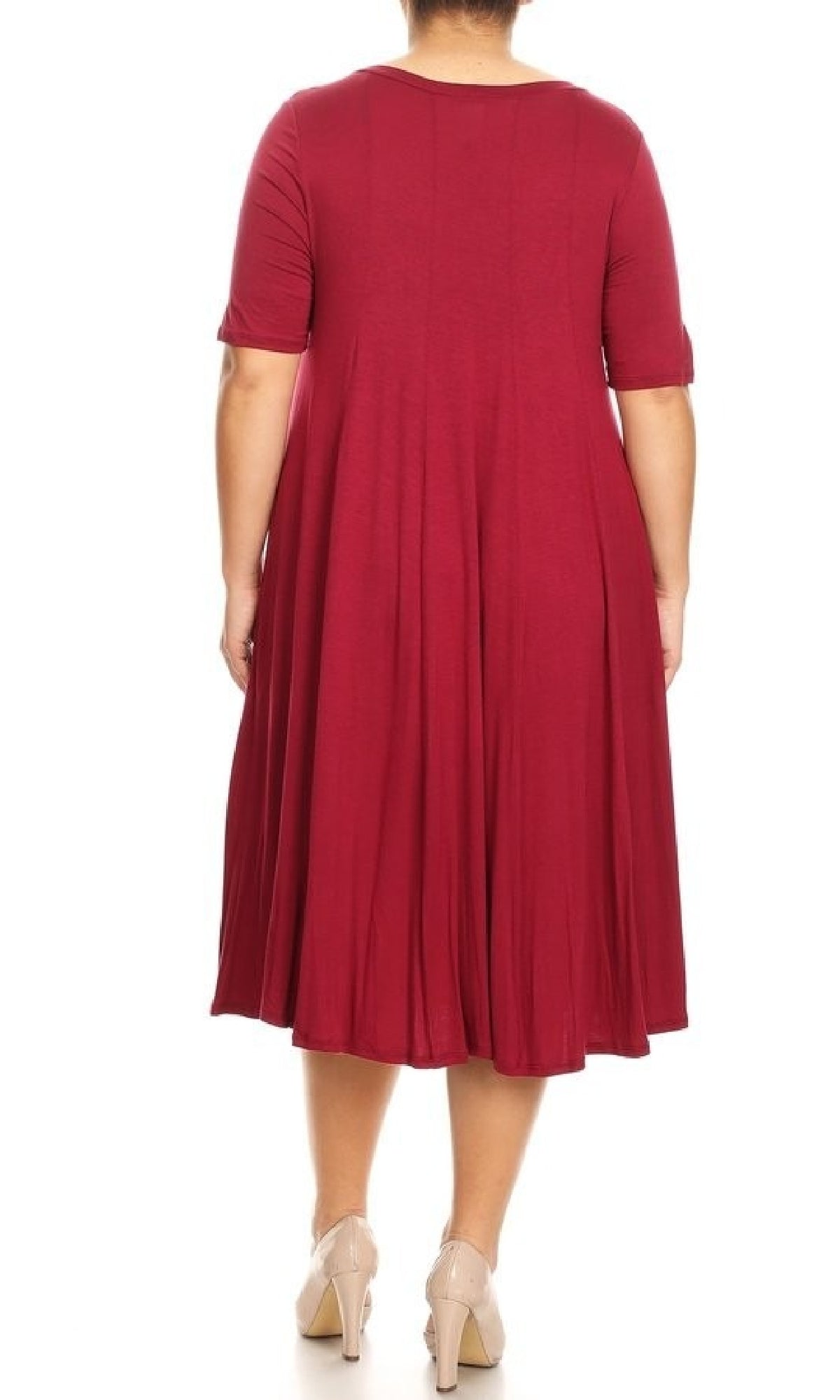 A person is shown from the back against a plain white background wearing the Plus-Size Jersey Knit Oversized A-Line Casual Dress in burgundy with short sleeves, knee-length hem, and beige heels.