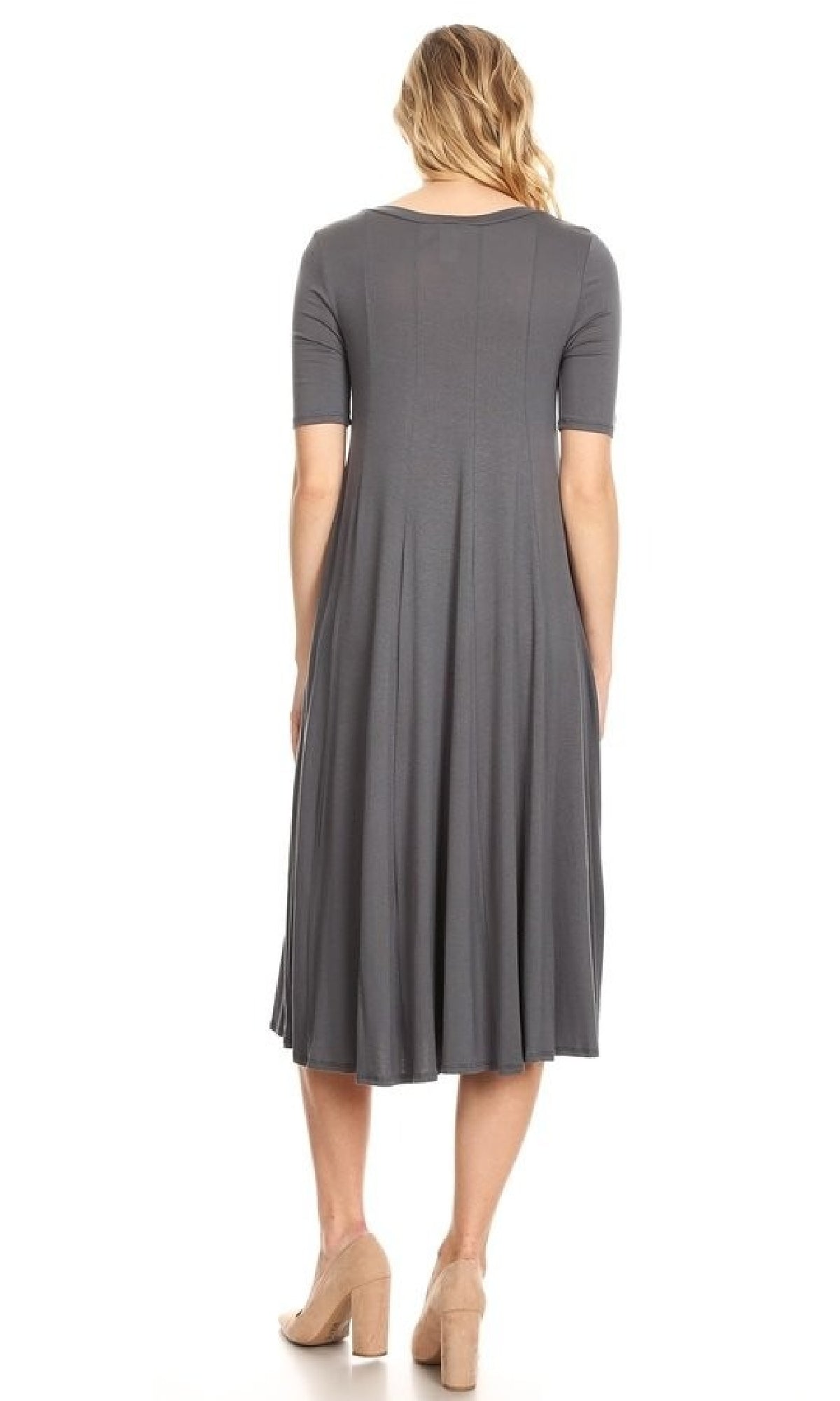 A woman stands with her back to the camera, wearing a Short Sleeve Casual Oversized Jersey Knit Dress in gray and beige high-heeled shoes, set against a plain white background.