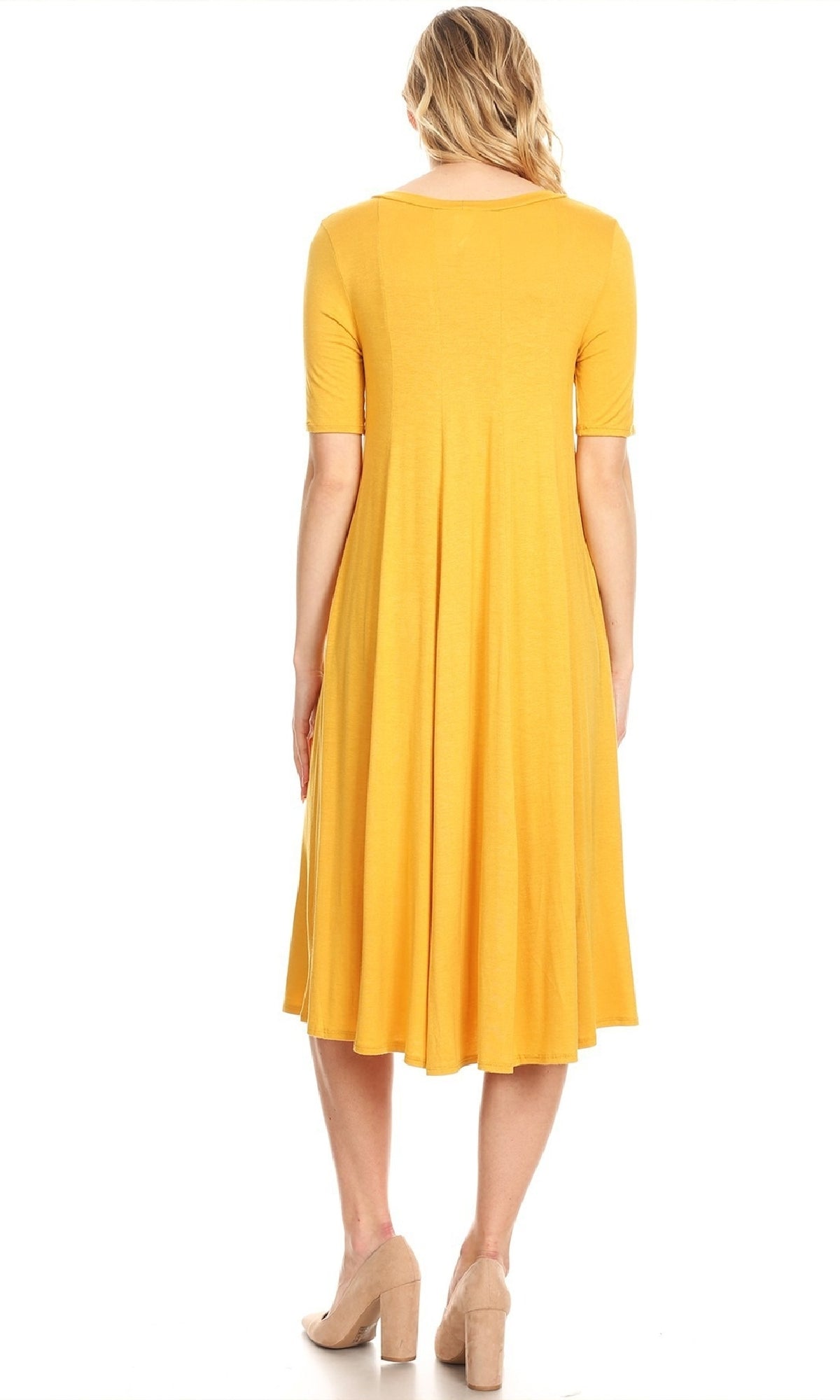 A blonde woman stands facing away, wearing a yellow Short Sleeve Casual Oversized Jersey Knit Dress and beige heeled shoes.