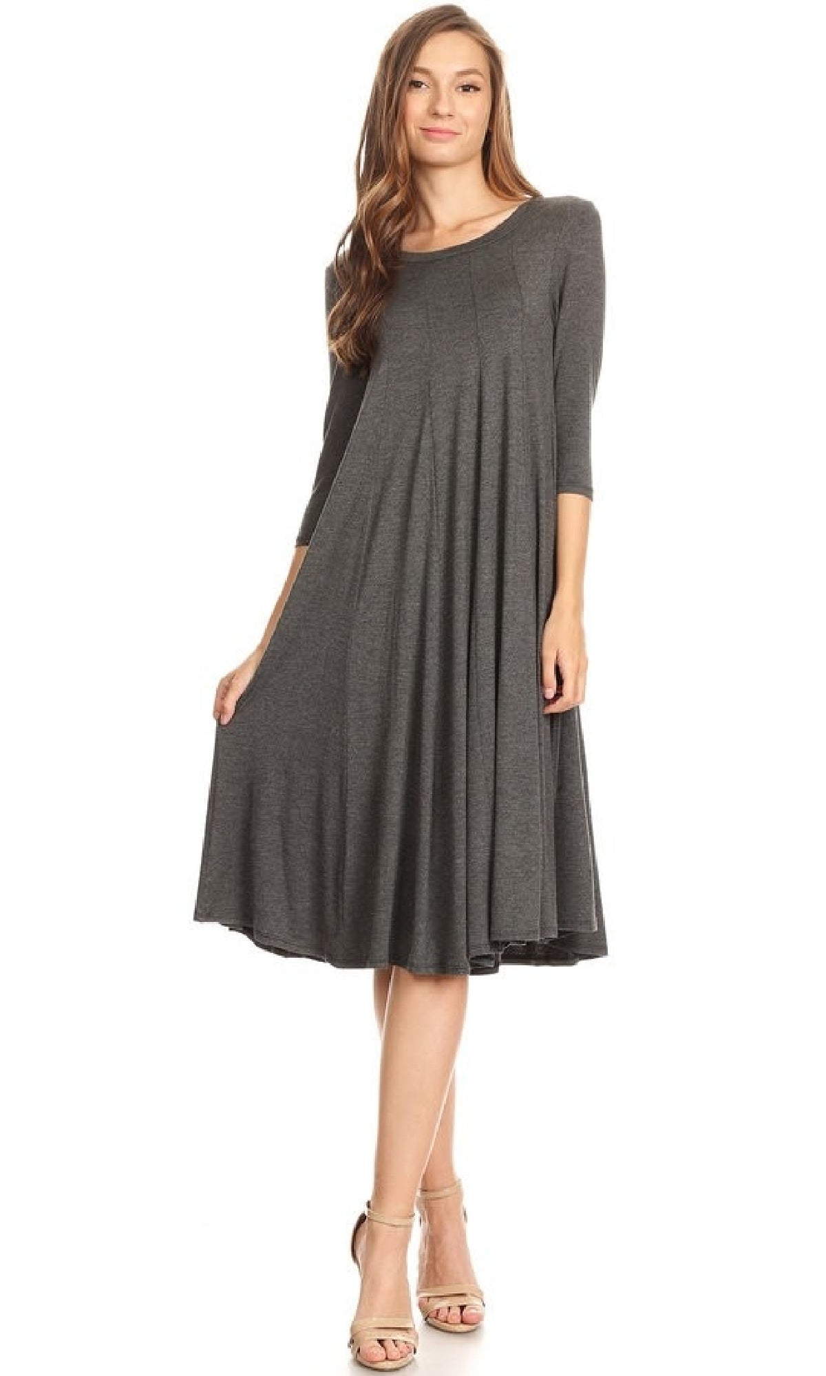 A woman stands against a white background wearing the Knee-Length Casual Party Dress in grey with beige strappy heels.