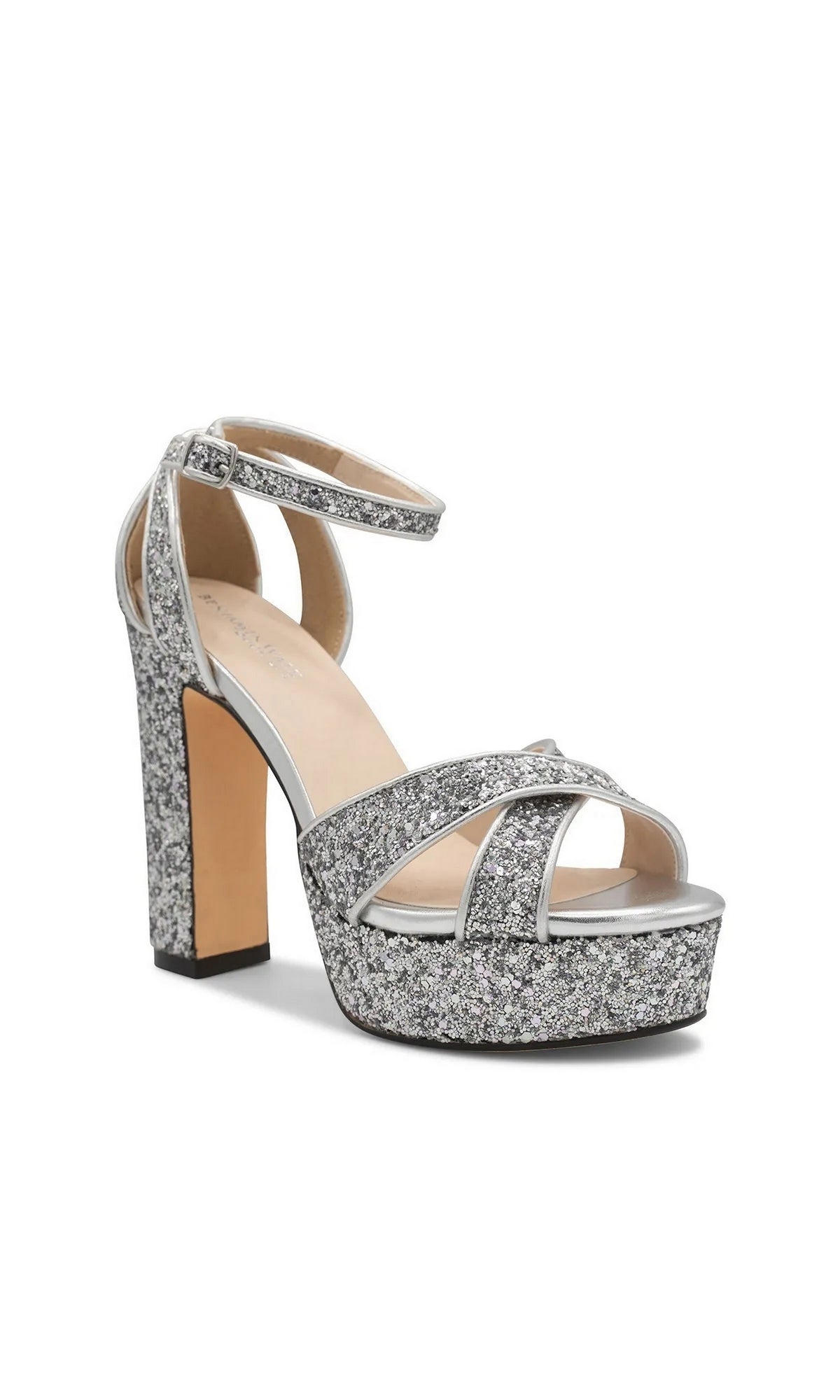 Jemma Silver Platform Prom Shoes: Touch Ups 4702 are silver glitter platform sandals featuring a high block heel and an ankle strap.