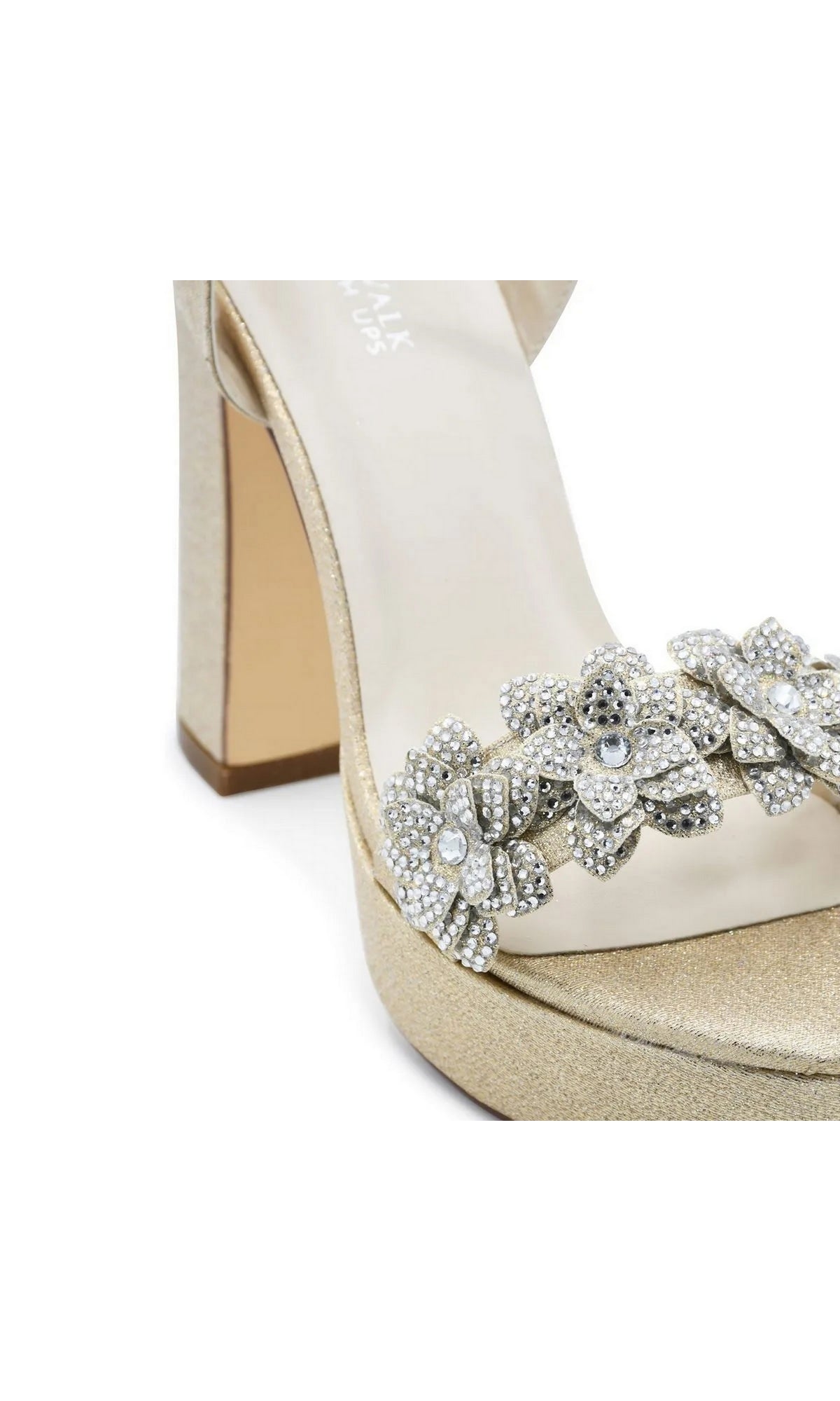 Lily Champagne Platform Prom Shoes: Touch Ups 4709, a champagne-colored block heel with a jeweled flower embellishment on the toe strap.