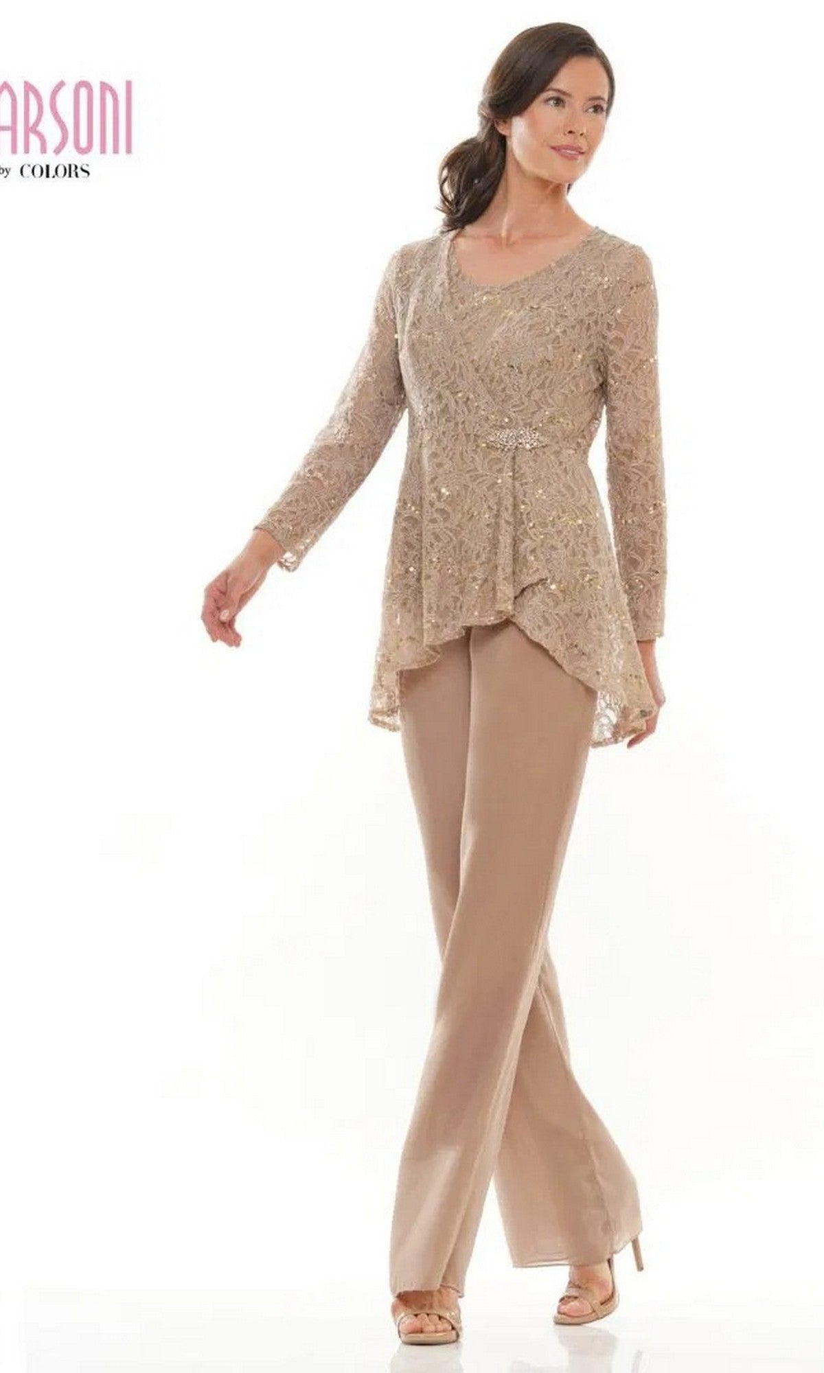 A woman models the Marsoni M305 long formal pantsuit, featuring a beige lace jacket with decorative details and matching chiffon pants, paired with heels, against a plain white background.