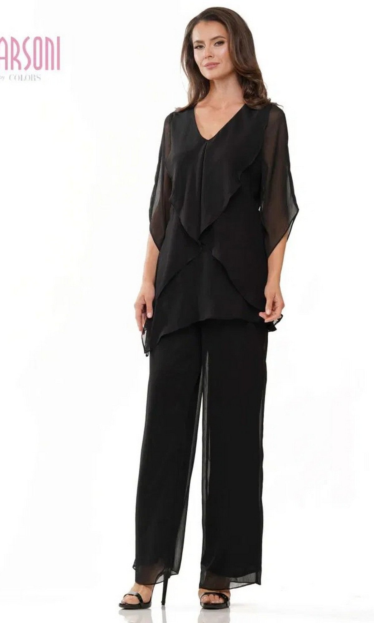 A woman poses against a white background wearing the Long Formal Pantsuit: Marsoni M308, featuring a loose fit, layered black design with sheer sleeves and matching wide-leg pants.