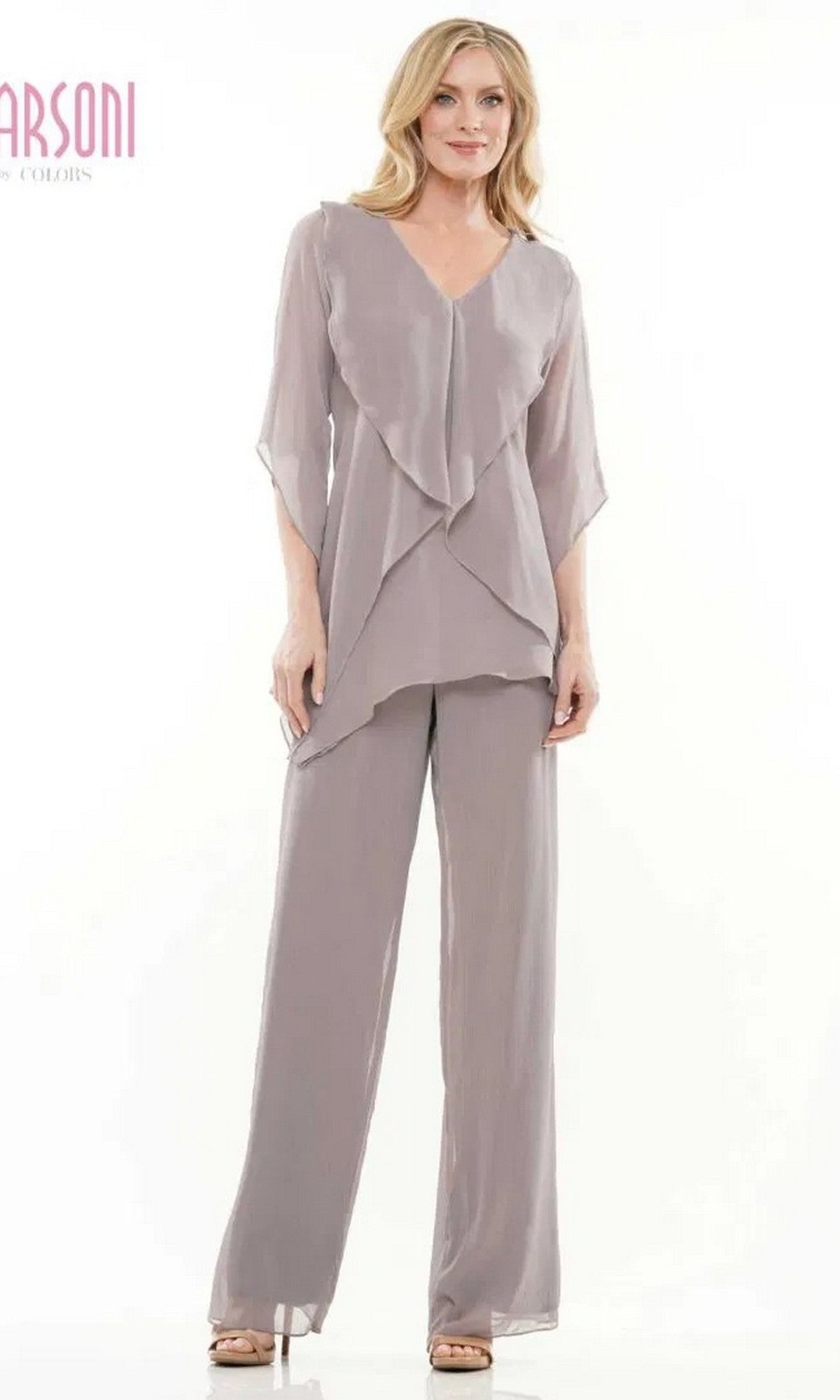 A woman models the Marsoni M308 Long Formal Pantsuit in grey, featuring a layered chiffon top with a subtle v-neck and wide-leg pants, posed against a plain white background.