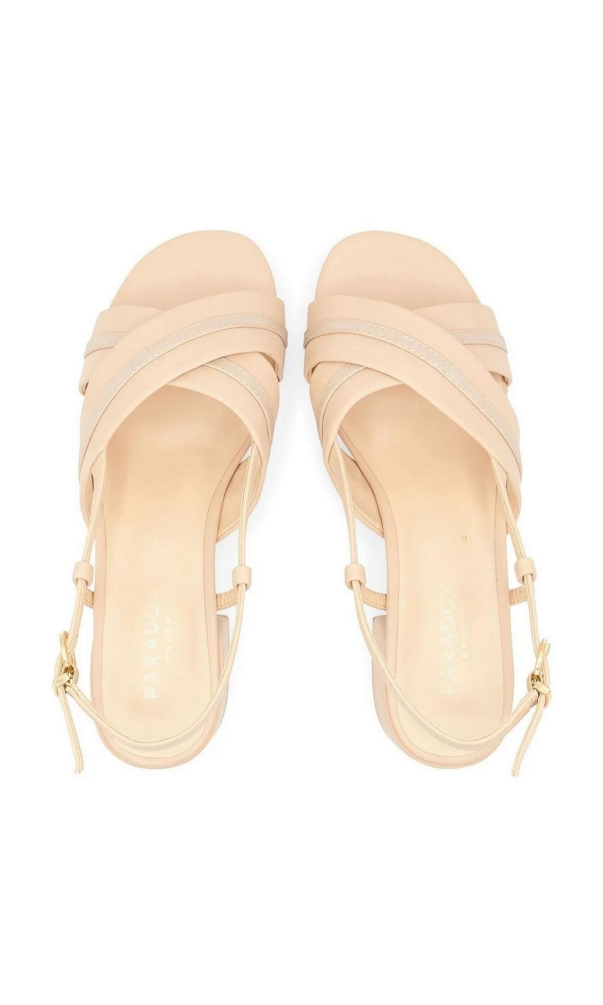 Nancy Nude Prom Shoes: Paradox London P2502 nude shimmer slingback sandals with a low block heel, crisscross toe straps, and adjustable buckle closures.