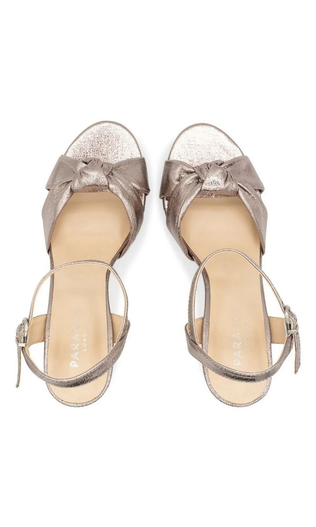 Top-down view of Nerita Pewter Prom Shoes: Paradox London P2506, featuring pewter metallic heeled sandals with a knotted toe strap and an adjustable ankle strap.