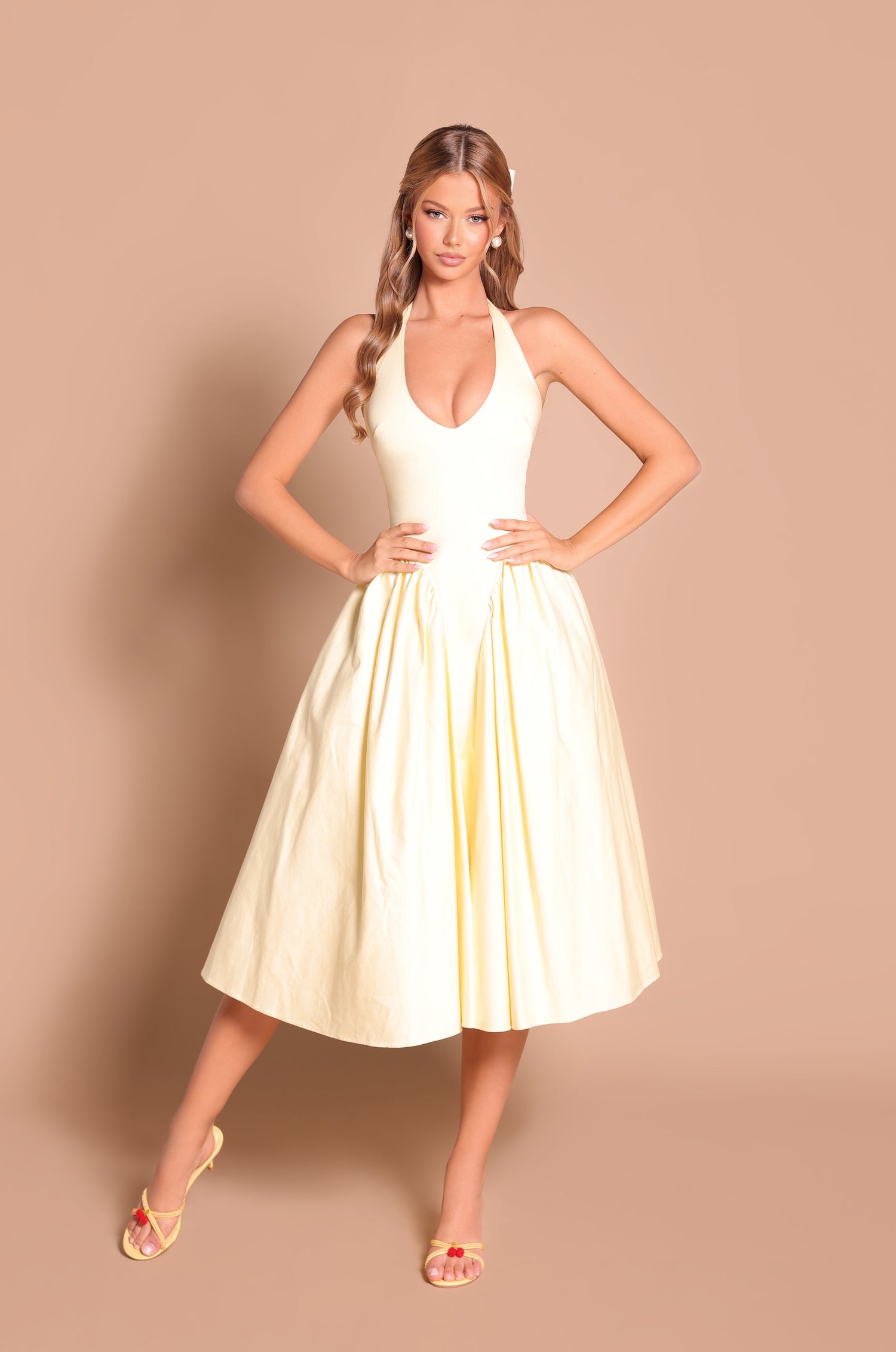 Buttercream Yellow halter midi dress with fitted waist