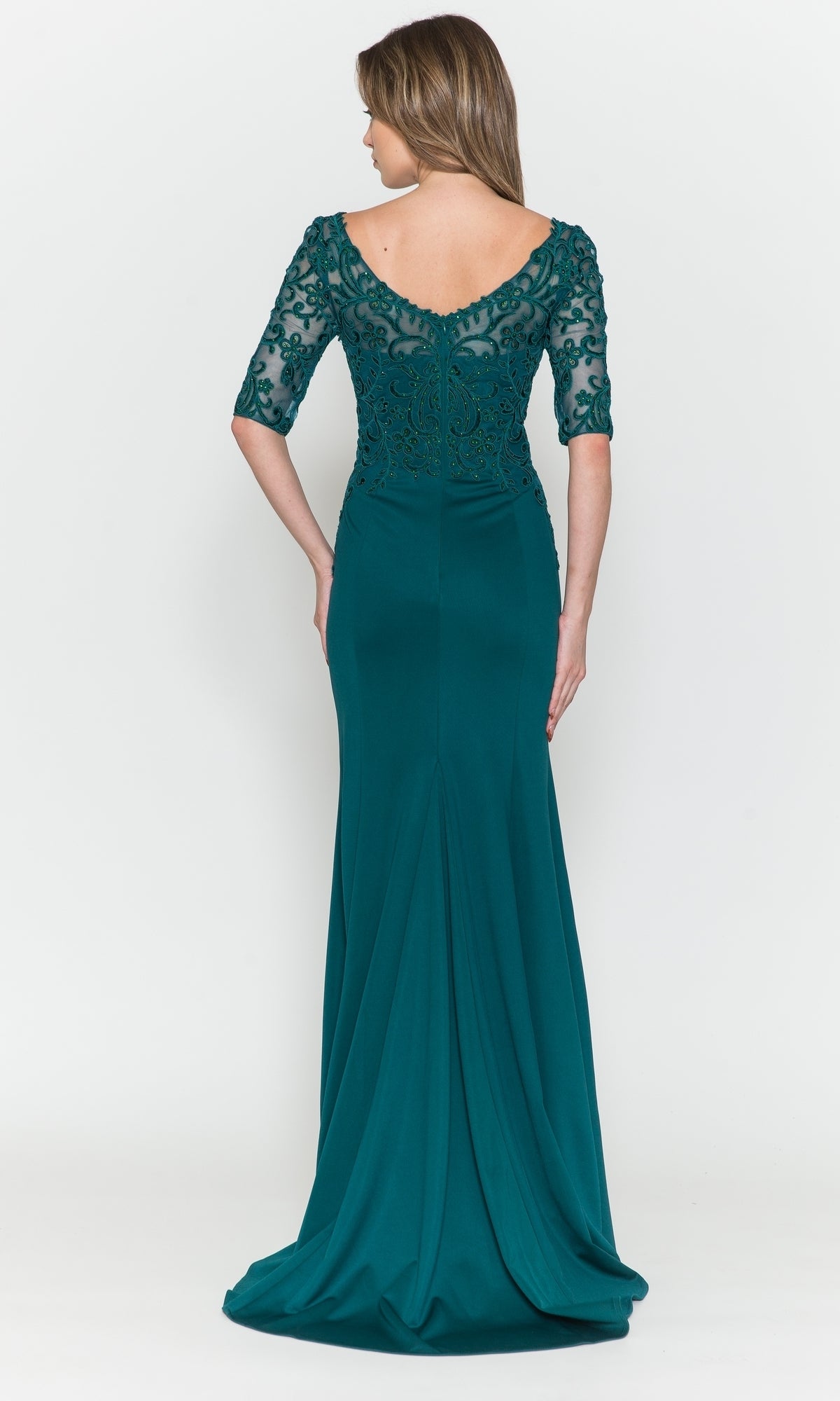 A woman is shown from the back wearing the Embroidered Sheer-Sleeved Formal Prom Dress 8560 in teal, featuring a floor-length skirt, illusion half sleeves, and an embroidered bodice, set against a plain white background.