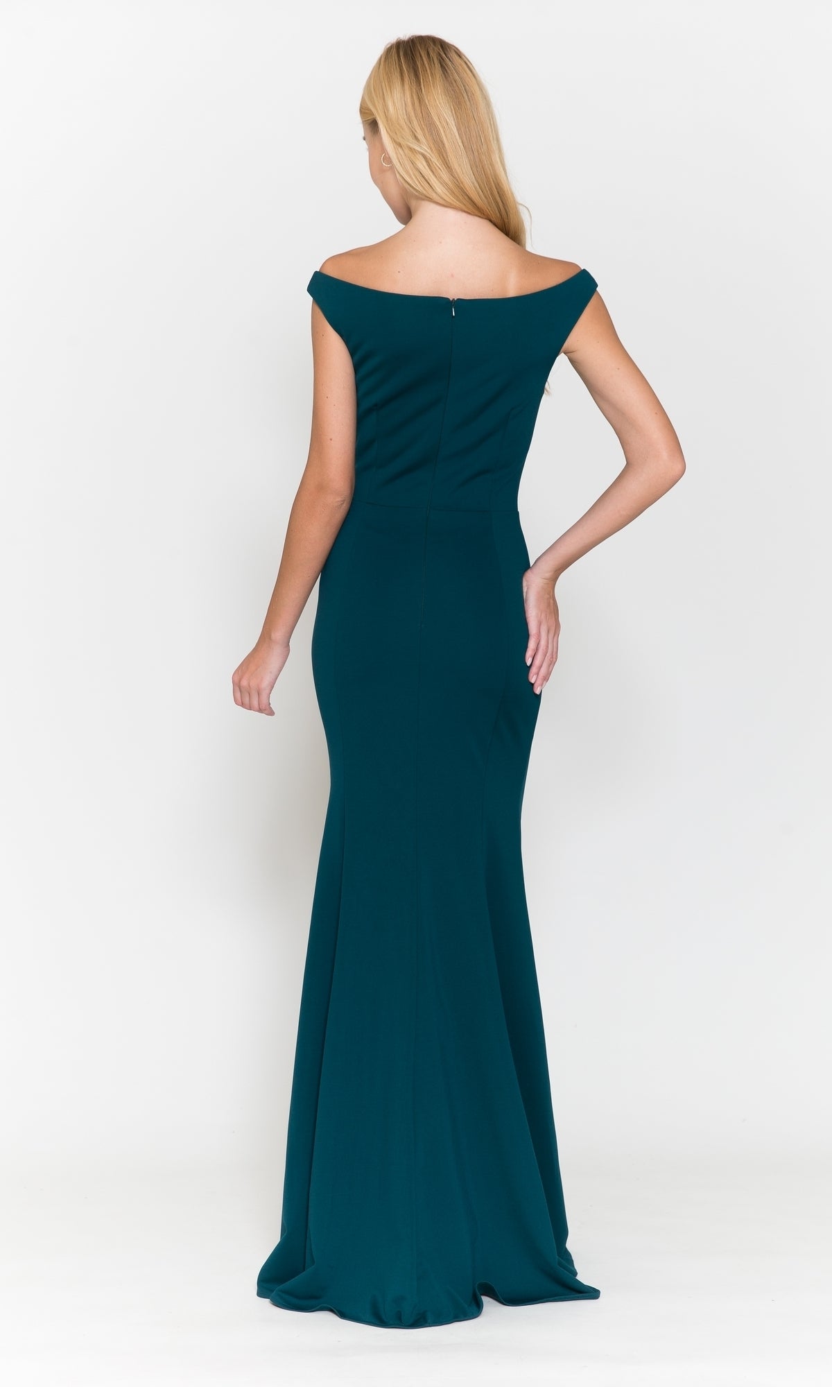A woman stands facing away, modeling the Off-the-Shoulder Classic Long Prom Dress 8724 in teal with a fitted silhouette and floor-length design against a plain white background.