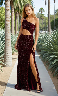 Woman in a burgundy sequin dress standing on a path with palm trees in the background