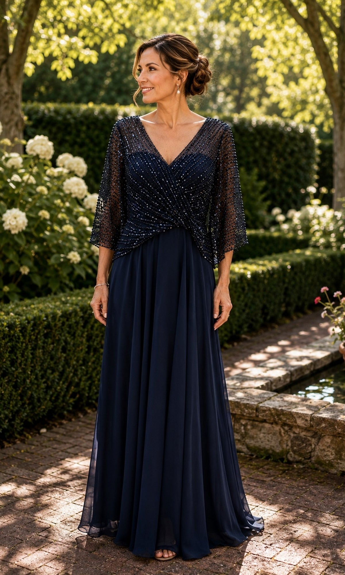 Navy blue Beaded Capelet Long Formal Dress: Rina Di Montella R102, featuring a V-neck bodice with a beaded overlay and wide, sheer sleeves.