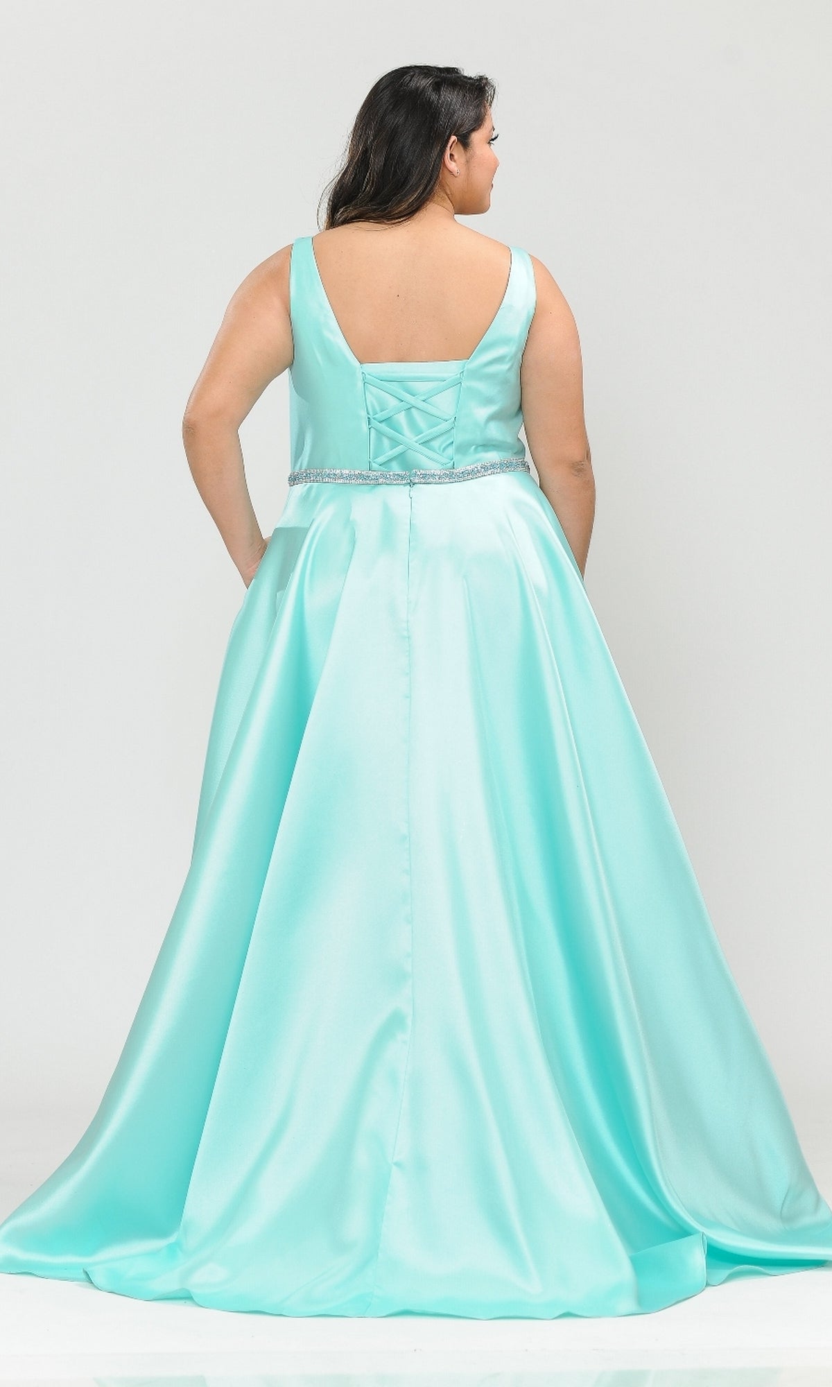 A woman is shown from the back wearing the V-Neck Plus-Size Long Prom Dress with Pockets W1108—a sleeveless, floor-length, light blue satin evening gown featuring a beaded waistband.