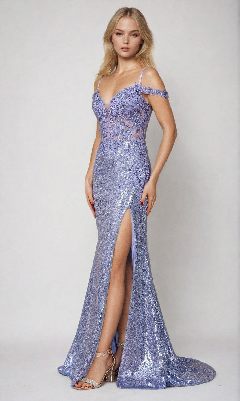 A woman models the Sheer-Corset Long Sequin Prom Dress (Poly USA 9398) in lavender, featuring a floor-length design, thigh-high slit, sheer bodice, and off-the-shoulder straps against a plain background.