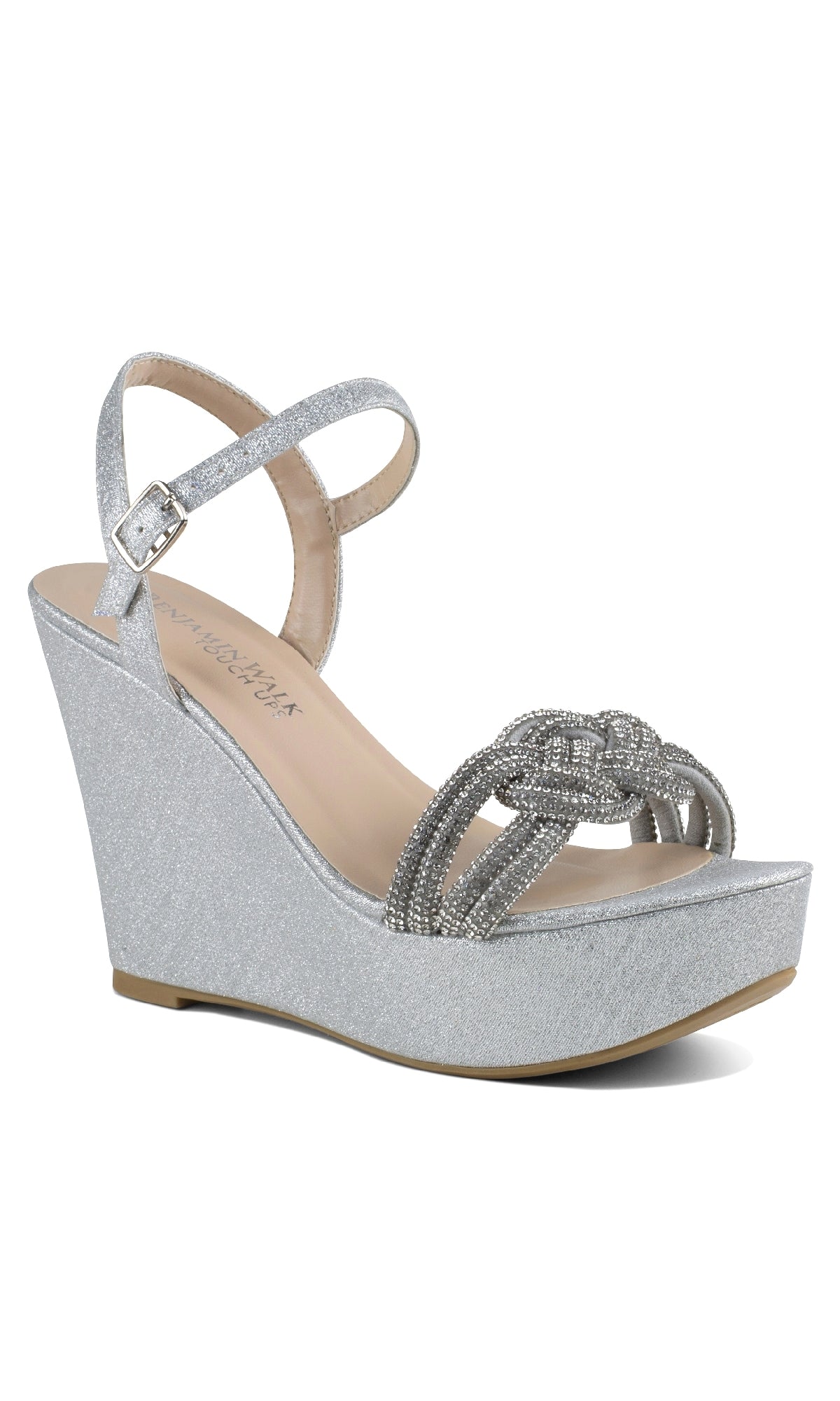 The Gemini Silver Glitter Wedge Prom Shoes (Touch Ups 4649) feature an ankle strap, glitter finish, and jeweled toe straps—perfect silver prom shoes for any special occasion.
