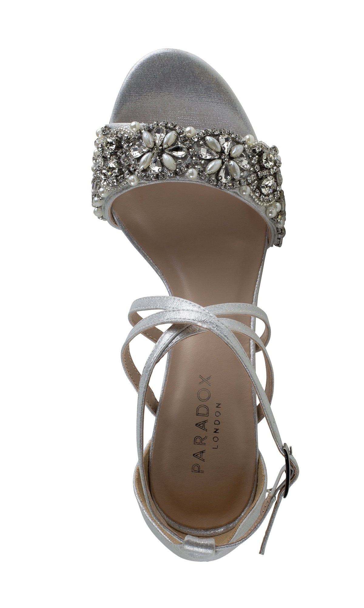 The Hira Silver Shimmer Prom Shoes (Paradox London P2101) feature jeweled toe straps, crisscross ankle straps with buckle closure, and subtle branding—making them perfect low-heel prom sandals.