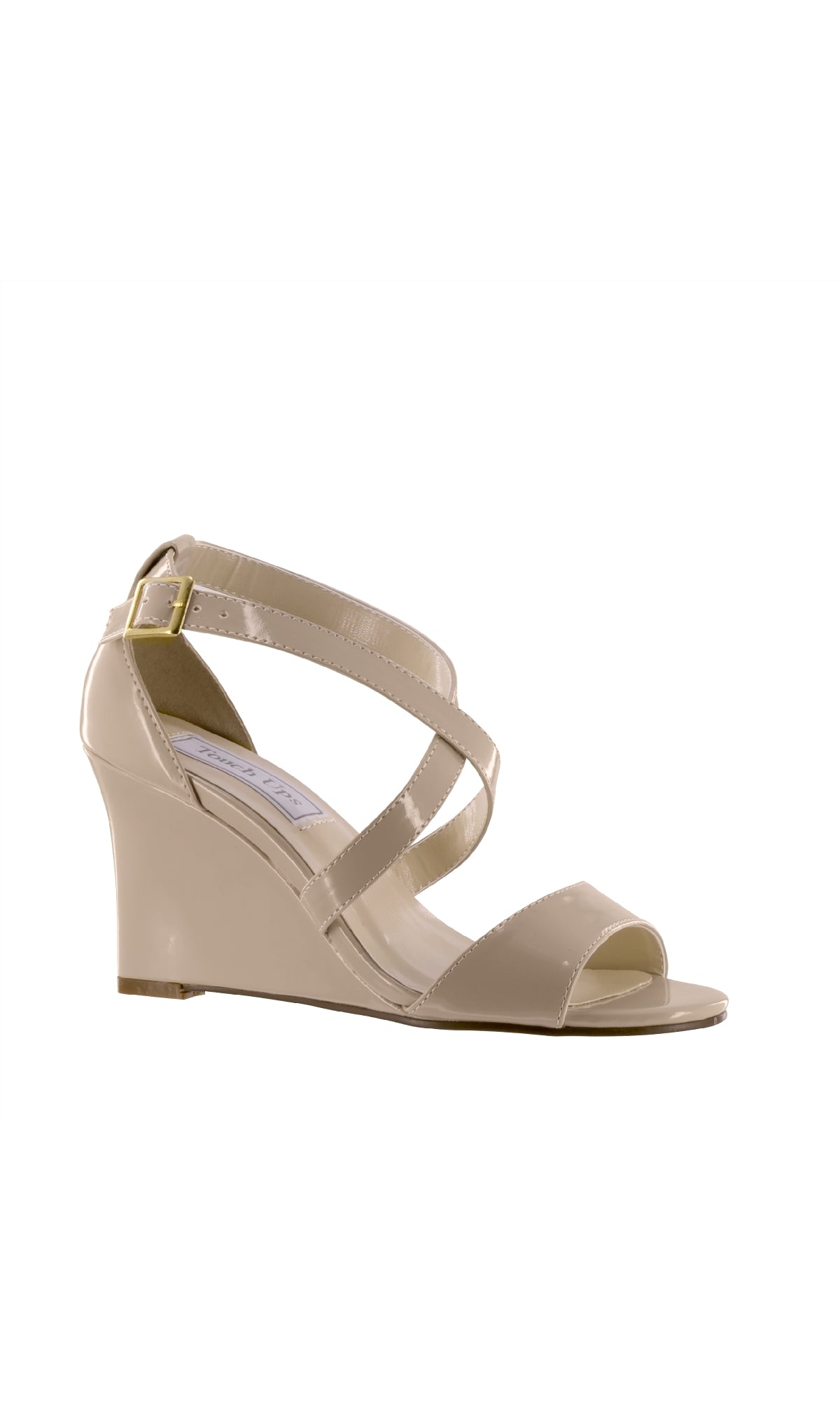 Jenna Nude Wedge Prom Shoes: Touch Ups 4179 feature beige patent leather, an open toe, crisscross ankle straps, and a gold buckle closure, all displayed on a white background.