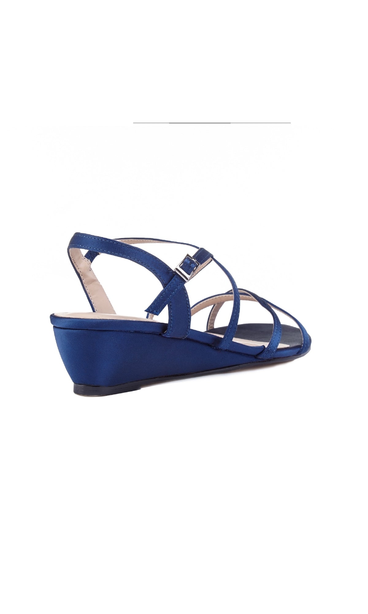 The Kadie Navy Prom Shoes (Paradox London P1805) feature a navy blue satin finish, low wedge heel, open toe strappy design, and a small buckle, displayed from a rear side angle against a white background.