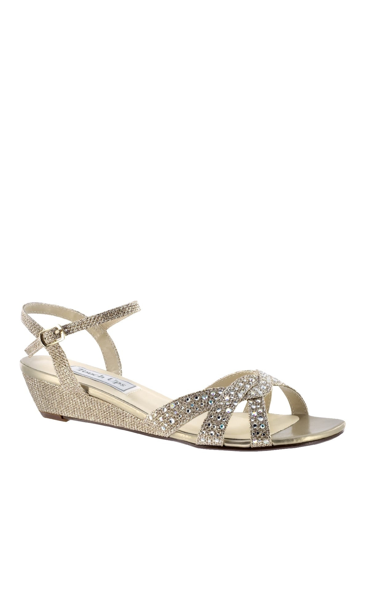 The Lena Open-Toe Champagne Prom Shoes: Touch Ups 4317 are low heel gold wedge sandals with ankle straps and rhinestone embellishments, shown on a plain white background—an elegant choice for formal prom looks.