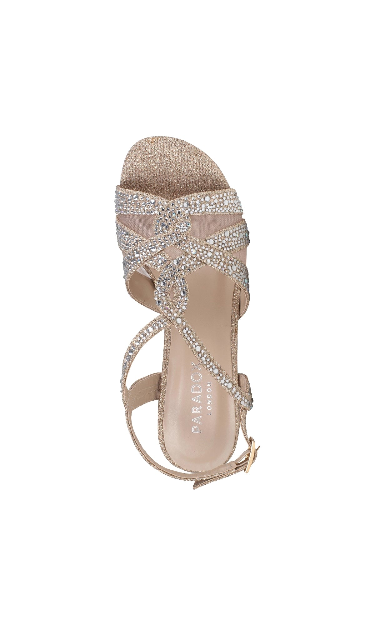 The Nadia Champagne Prom Shoes by Paradox London (P2207) feature rhinestone-covered crisscross straps, block heels, a small ankle buckle, and an open-toe design in beige, shown from an overhead view.