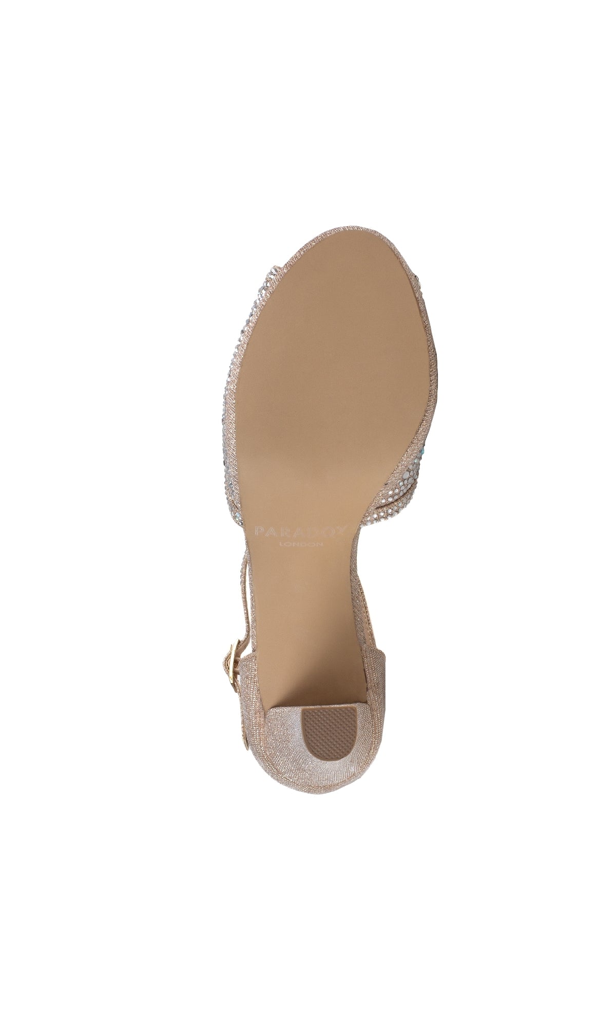 A top-down view of the sole of the Nora Champagne Prom Shoes: Paradox London P2225, an open-toe stiletto heel sandal with a textured strap, buckle closure, and a blank tan outsole against a white background.