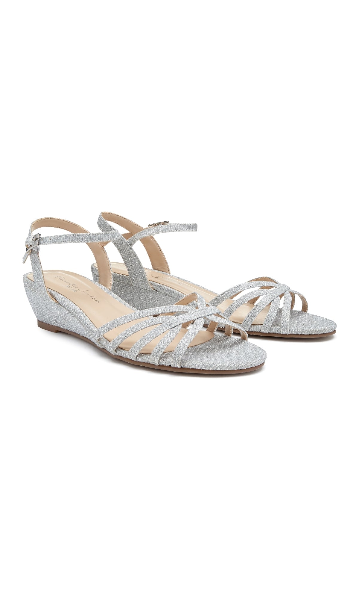 The Winslow Silver Prom Shoes: Paradox London P1841 are showcased against a white background, featuring a textured finish, buckle ankle strap, and low strappy wedge design—ideal for prom.