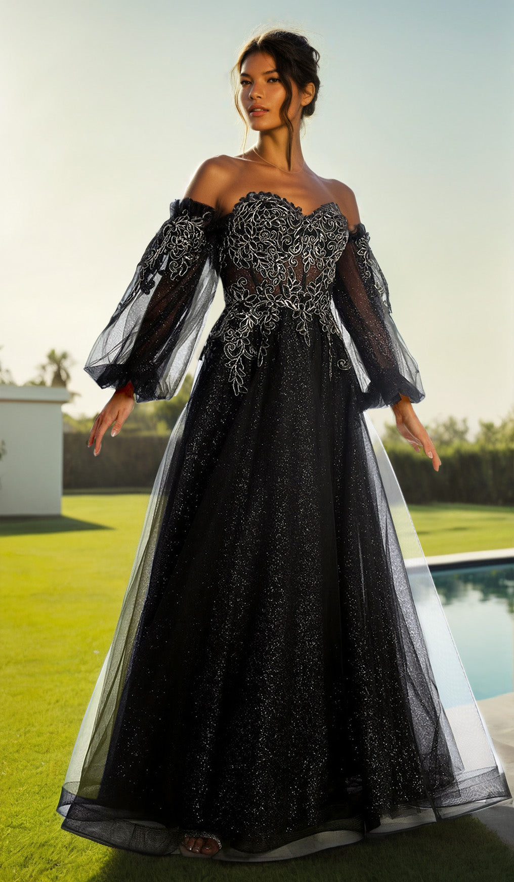 A woman poses outdoors in the Chicas CHF3093 Long Sleeve Long A-Line Prom Dress, featuring a glittery embroidered bodice and sheer embellished sleeves. A green lawn and pool create a stunning backdrop.