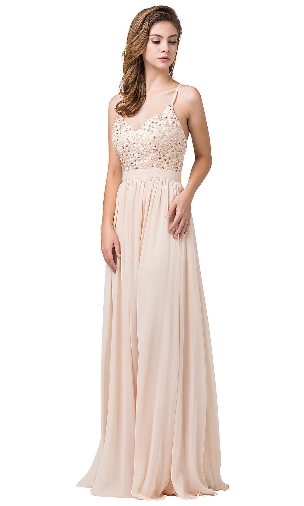 Woman wearing a Long Prom Dress with Criss-Cross Back Straps featuring a fitted, sequin-embellished bodice and flowing light beige skirt—an elegant, floor-length gown perfect for any evening event.