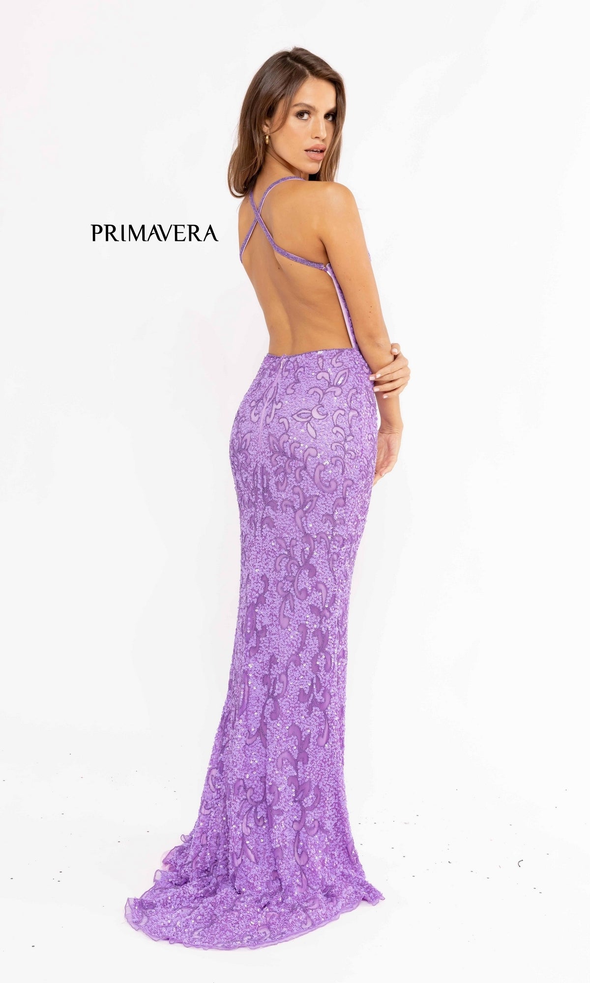 A woman models the Bright Sequin-Pattern Long Prom Dress, a long, fitted gown with an open back, against a white background. The word