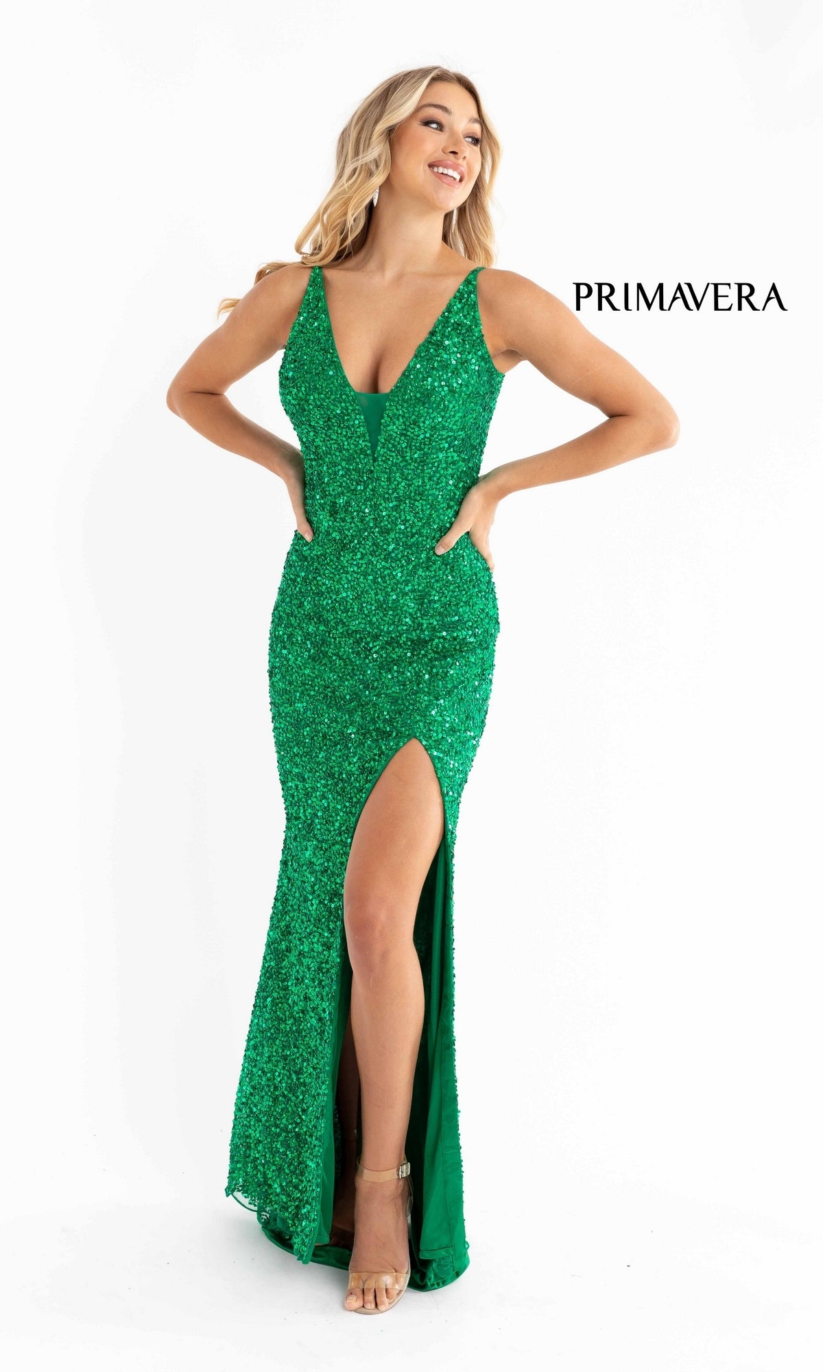 A woman models the Bright Sequin-Print Long Prom Dress 3792B—sleeveless, green, with sequins, a deep V-neck, and high slit—standing against a white background beside the word