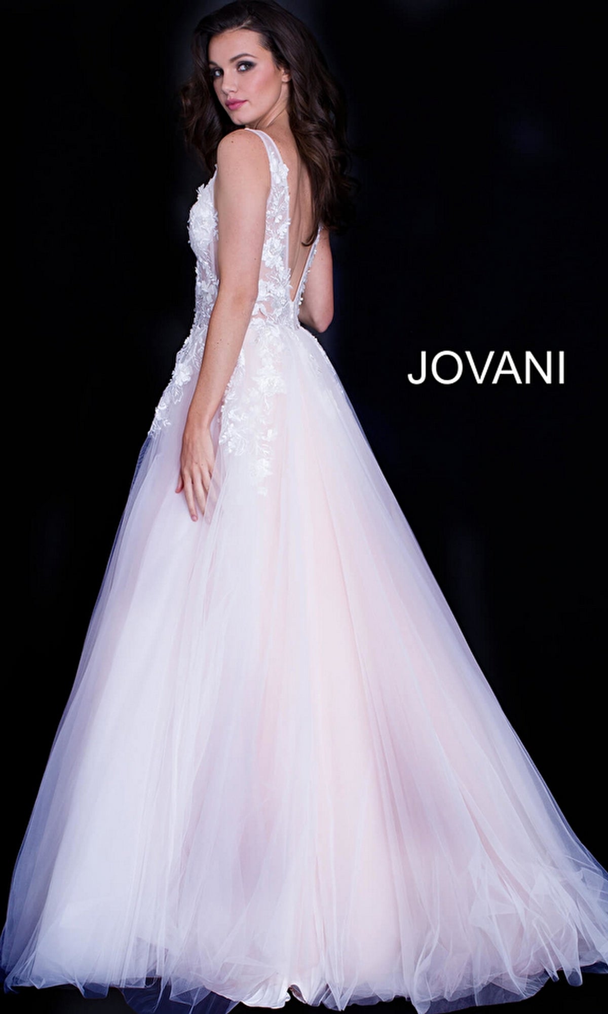 A woman poses against a black background wearing the Jovani Tulle Prom Ball Gown with Floral Appliques. The Jovani brand name is displayed beside her.