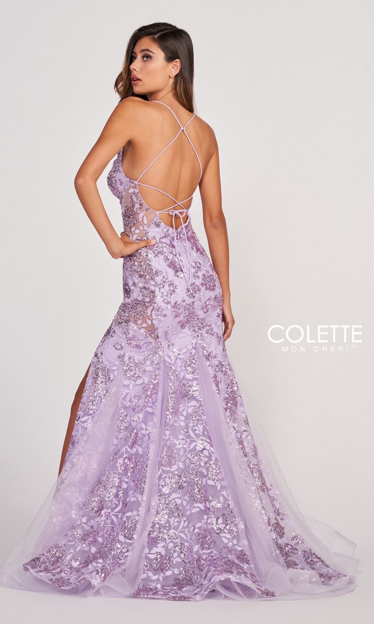 A woman poses in the Colette Long Sequin Prom Dress with Sheer Sides, featuring a shimmering silhouette and stylish details. The COLETTE Mon Cheri logo is visible in the bottom right corner.