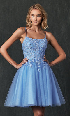 A woman wears the Embroidered-Corset Babydoll Homecoming Dress 860, a light blue, sleeveless short dress with floral lace bodice detailing, standing against a dark background.