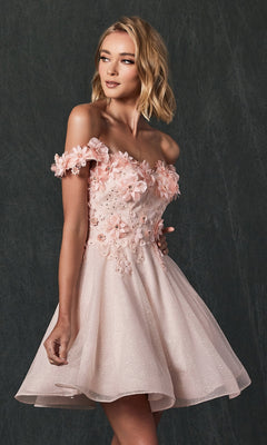 Woman wearing the Floral Off-the-Shoulder Short Homecoming Dress 861 in light pink with 3-D floral embellishments, posing against a dark textured background.