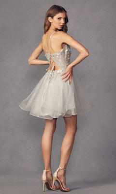 Woman wearing the Short A-Line Butterfly Homecoming Dress 902 with a lace-up back, posing in strappy heels against a plain gray background.