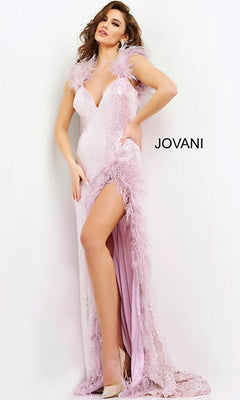 A woman wears the Long Prom Dress 06164 by Jovani, a light pink sequin formal gown with feather trim and a thigh-high slit, standing against a white background. The word "JOVANI" appears beside her.