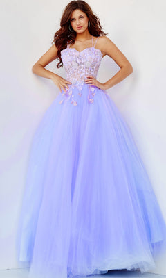 A woman models the Lilac Purple Sheer-Bodice Prom Ball Gown by Jovani, which features a fitted lace bodice and flowing tulle skirt, set against a plain white background.